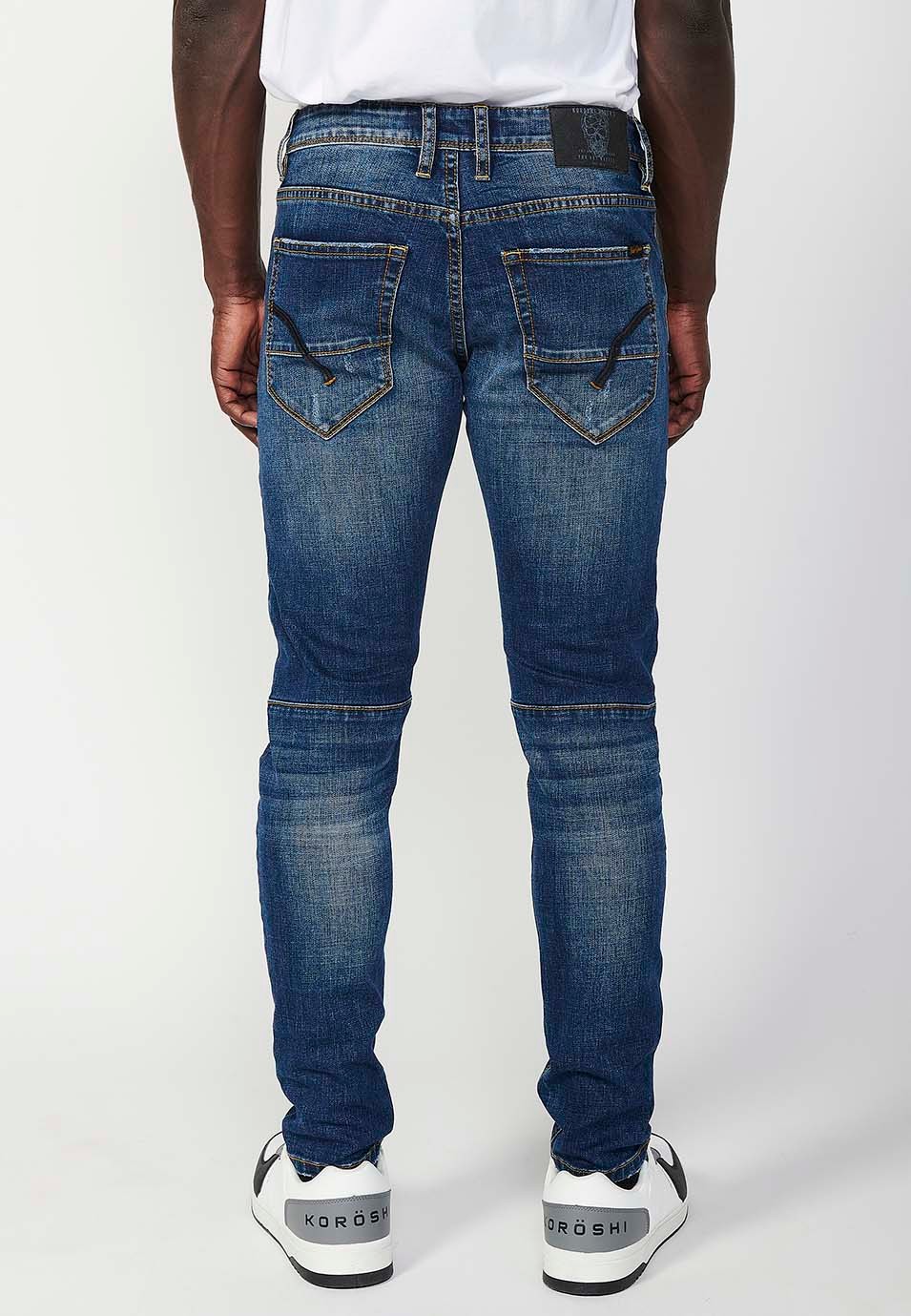 Pantalon motard long coupe skinny avec fermeture éclair et bouton sur le devant et détails sur les genoux en Bleu pour Homme