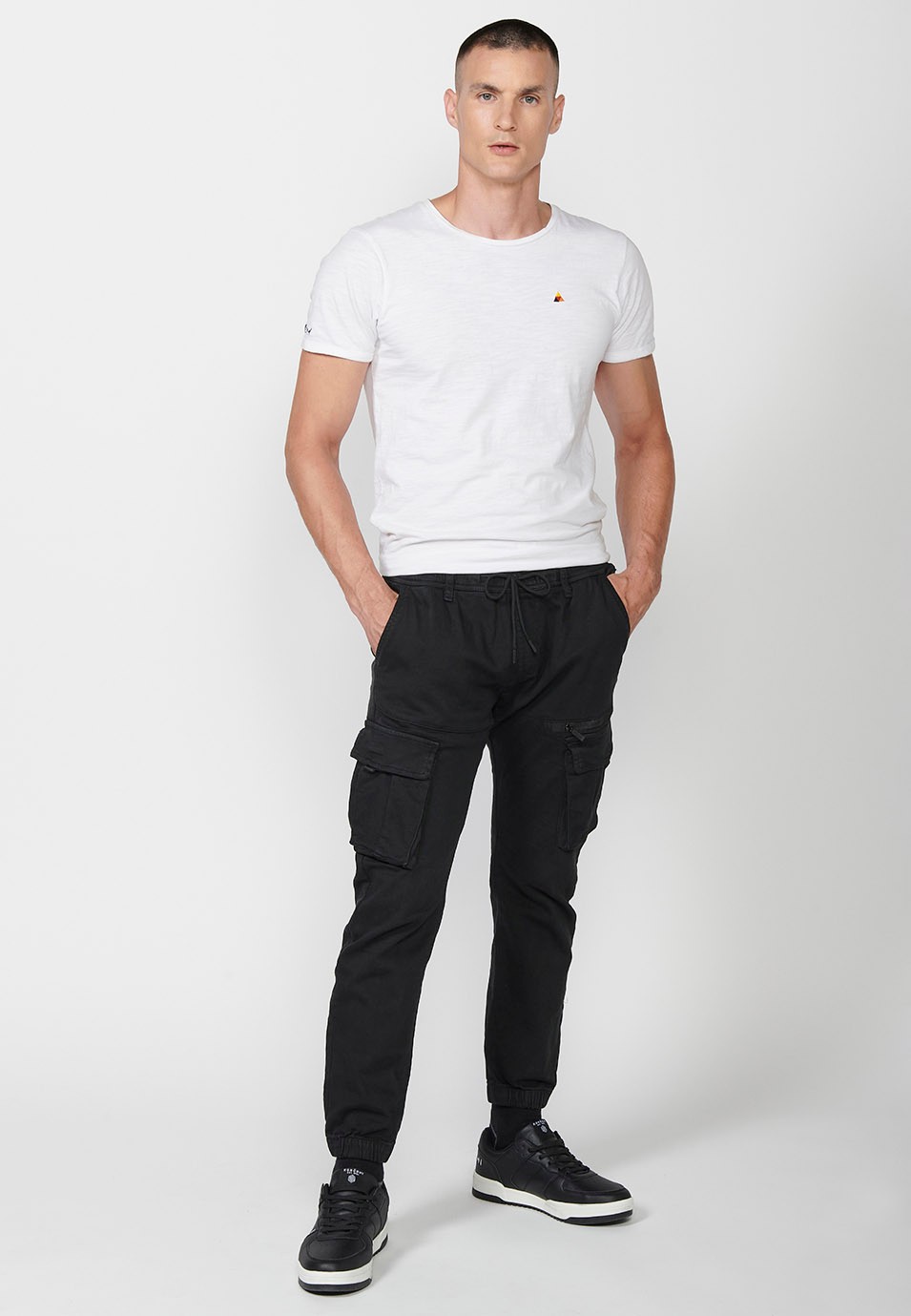 Men's black jogger pants with elastic waist and ankles and pockets