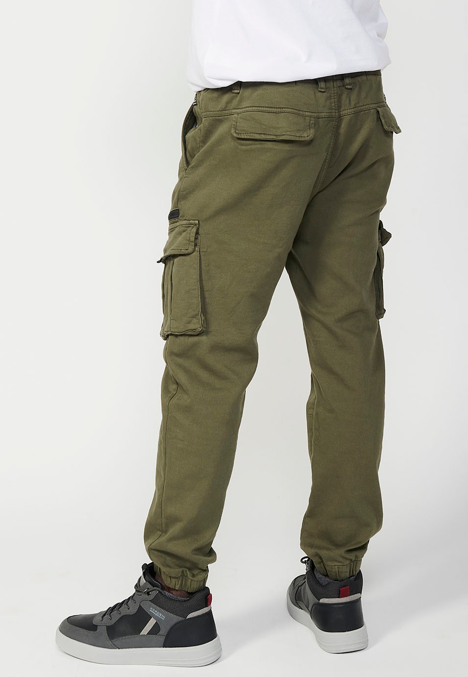 Long jogger pants with elastic waist and ankles and pockets for men in green 6