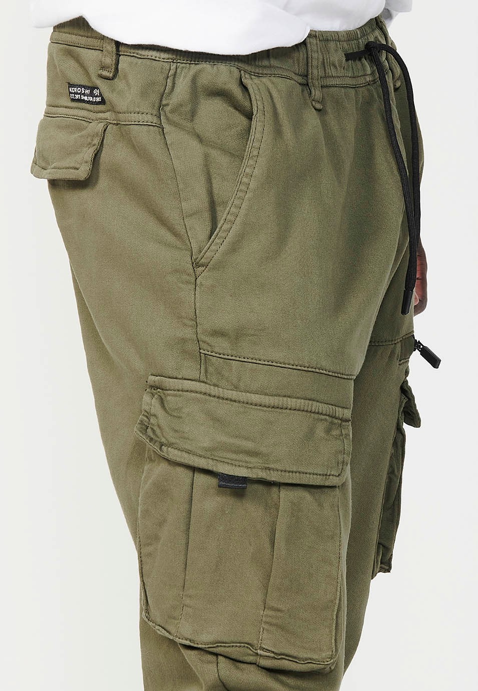 Long jogger pants with elastic waist and ankles and pockets for men in green 9