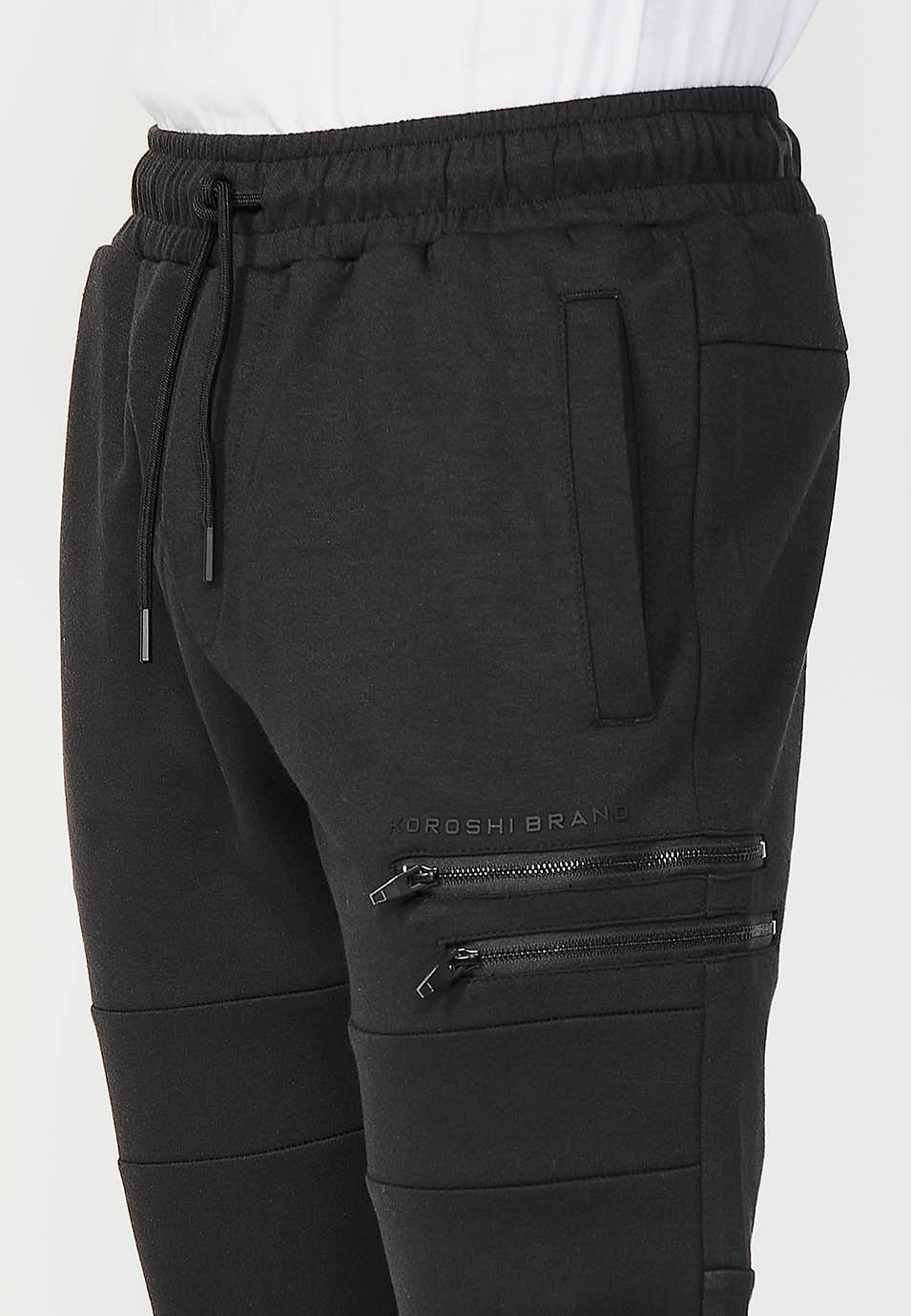 Pantalón largo jogger con cintura engomada y bolsillos con costuras en las rodillas para hombre de color negro 6