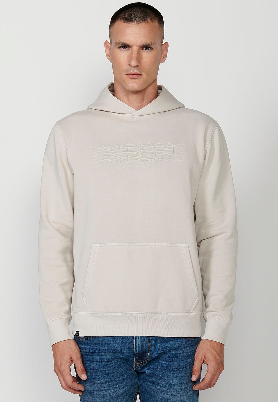 Sudadera de manga larga y cuello con capucha y detalle delantero con bolsillos delanteros para hombre de color ocre