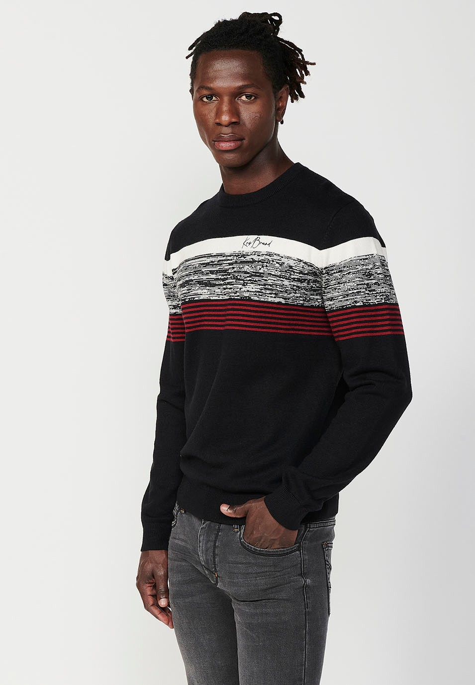 Pull en tricot noir à manches longues et col rond avec détail sur le devant pour homme