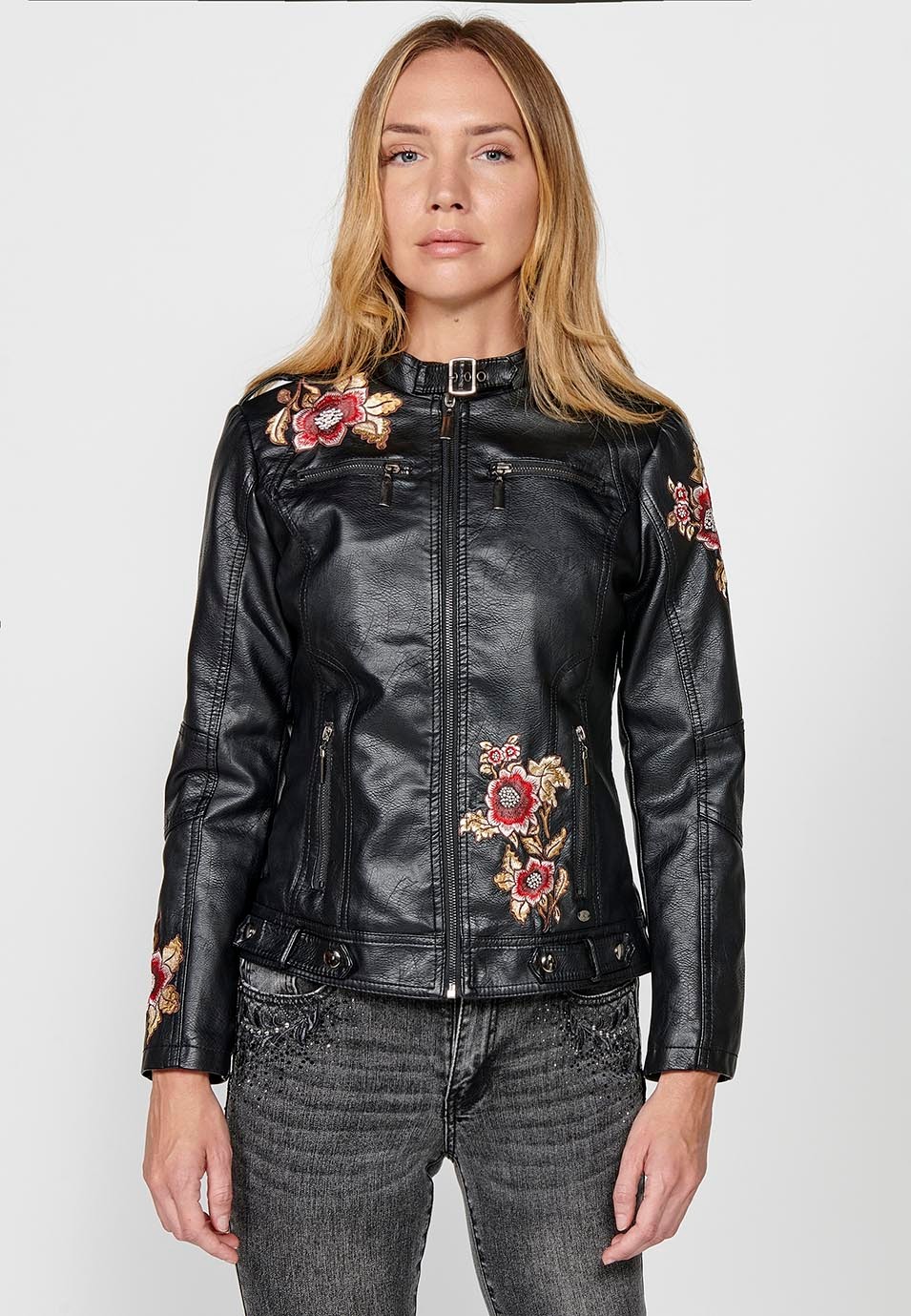 Faux leather jacket with embroidered floral details and front zip closure for women in black