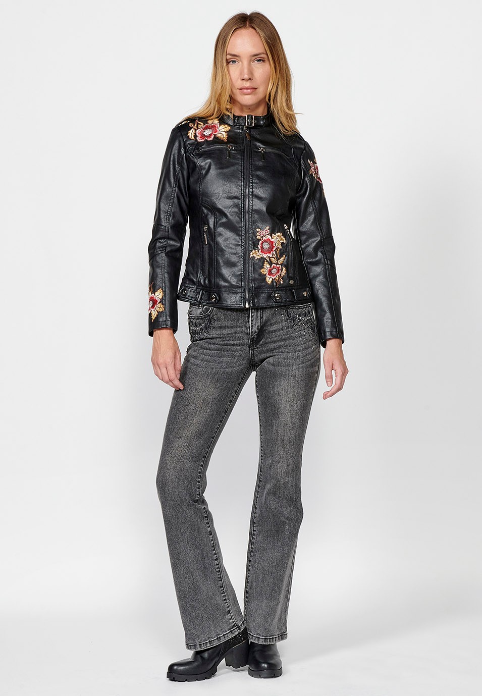 Faux leather jacket with embroidered floral details and front zip closure for women in black