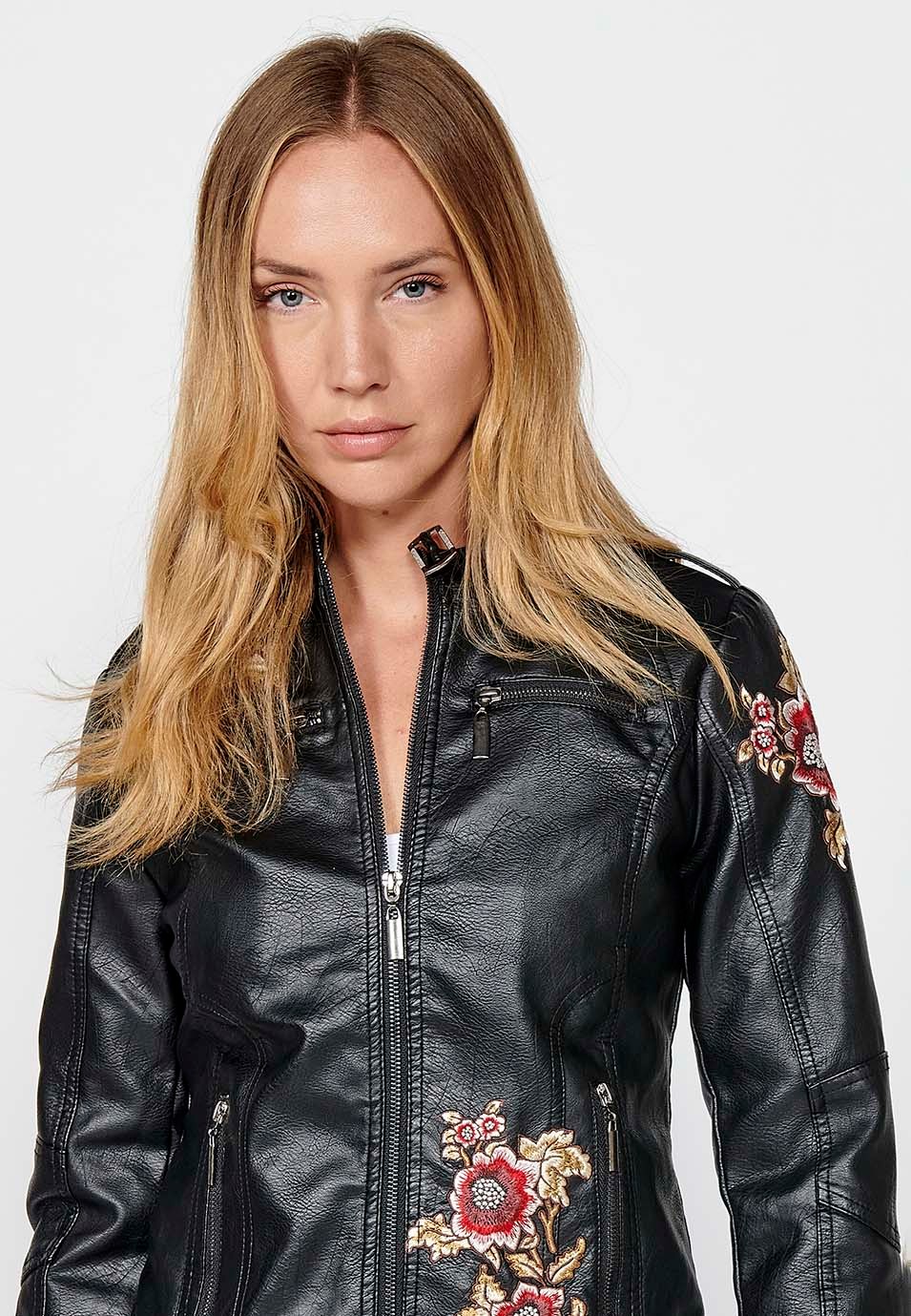 Faux leather jacket with embroidered floral details and front zip closure for women in black