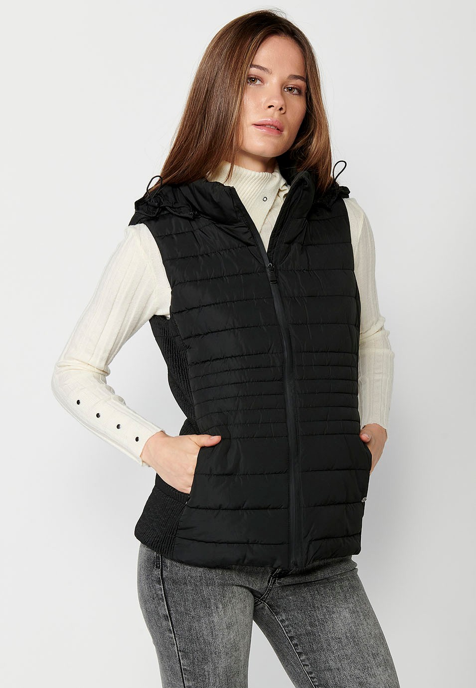 Padded vest with black hood and ribbed edges for women