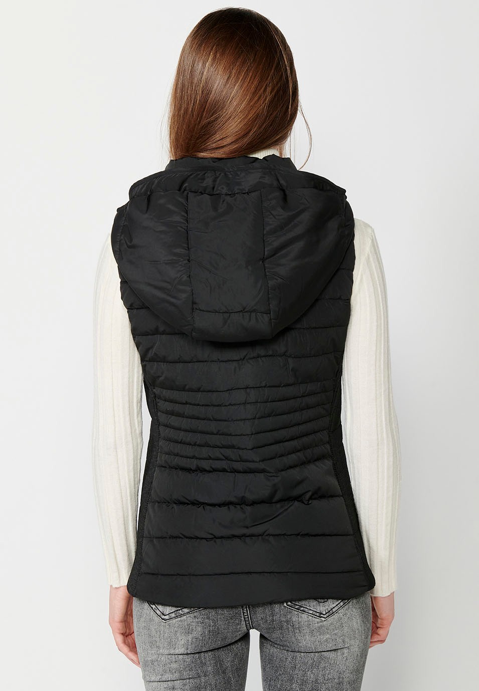 Padded vest with black hood and ribbed edges for women