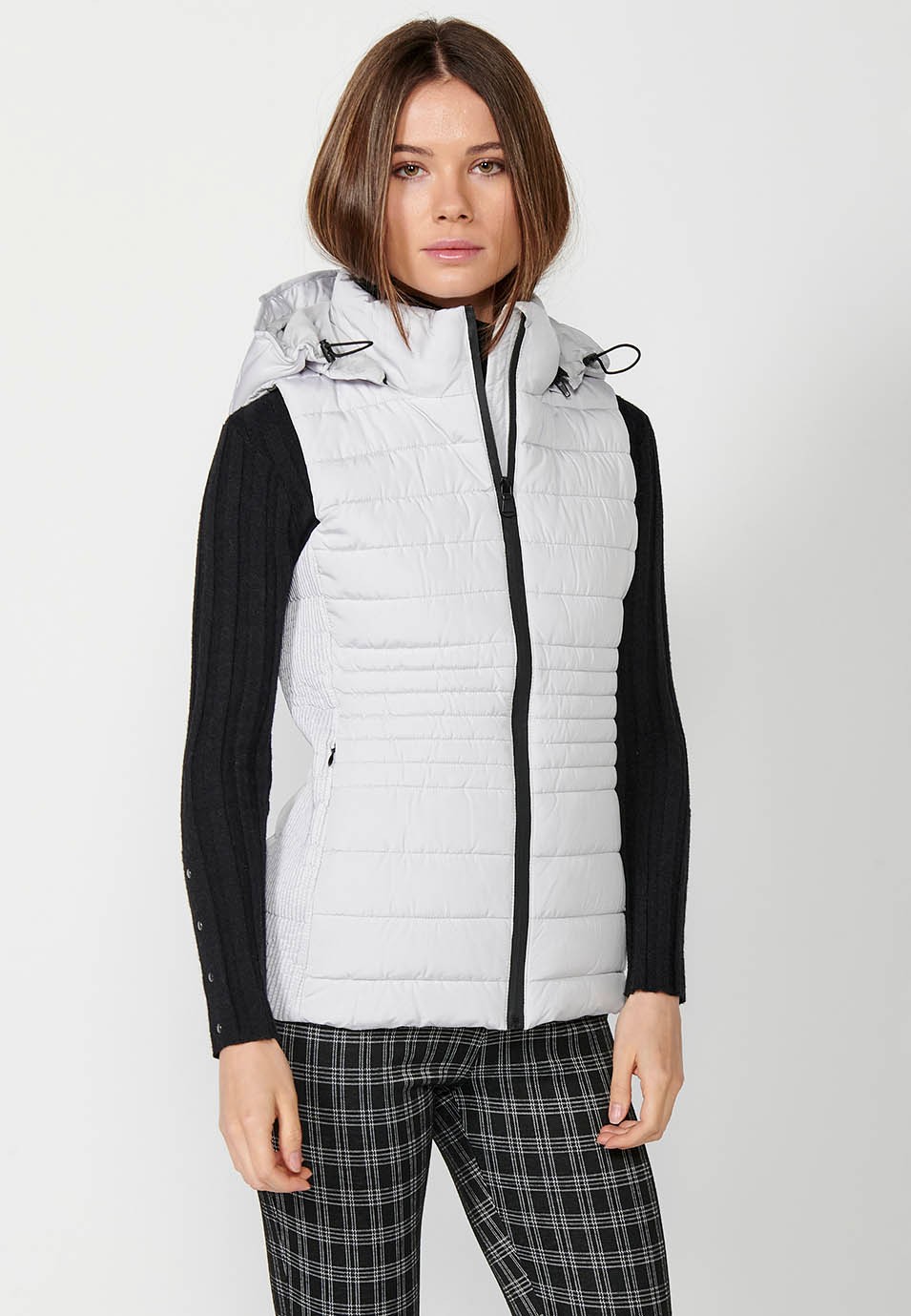 Women's pearl gray hooded padded vest with ribbed edges