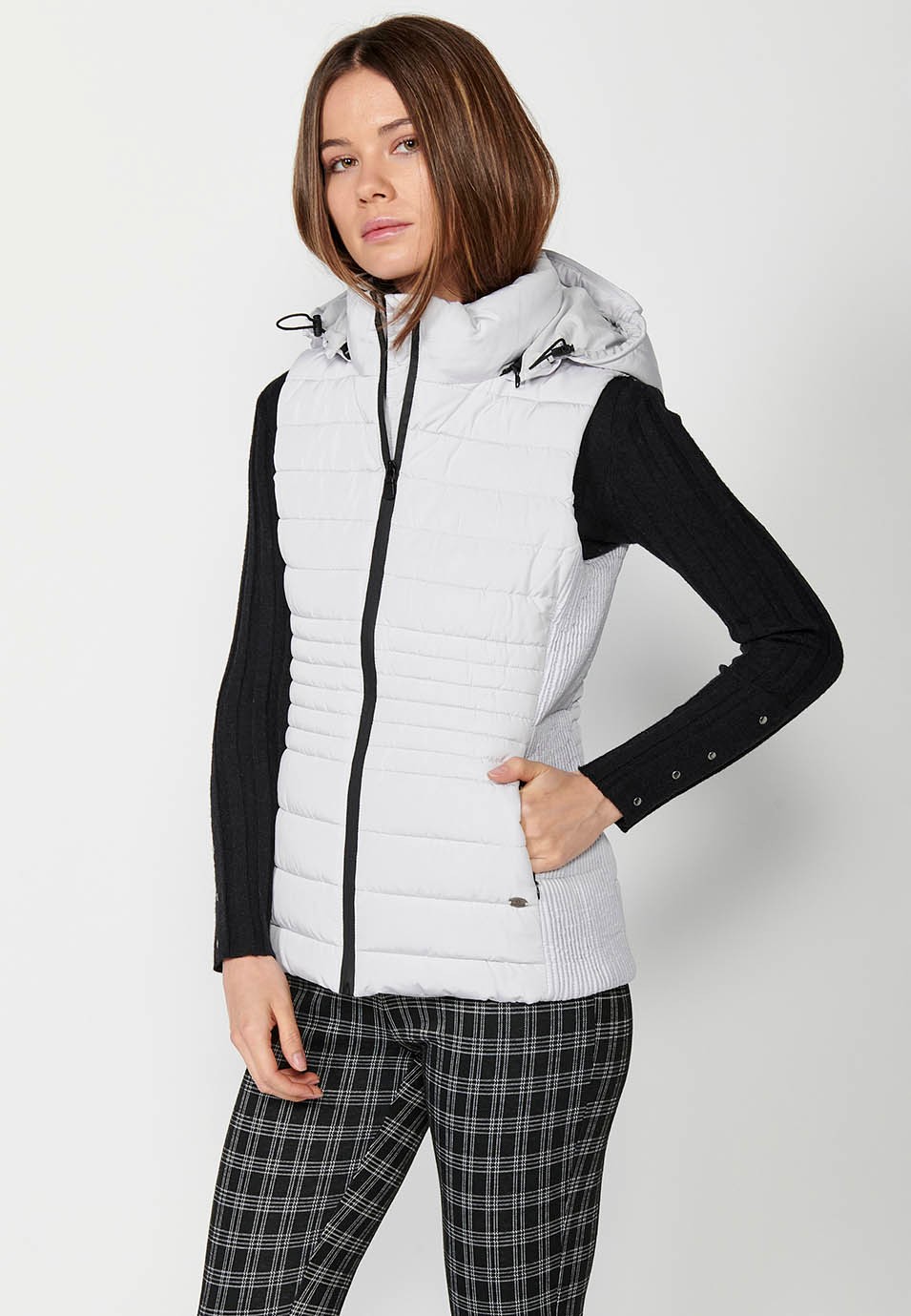 Women's pearl gray hooded padded vest with ribbed edges