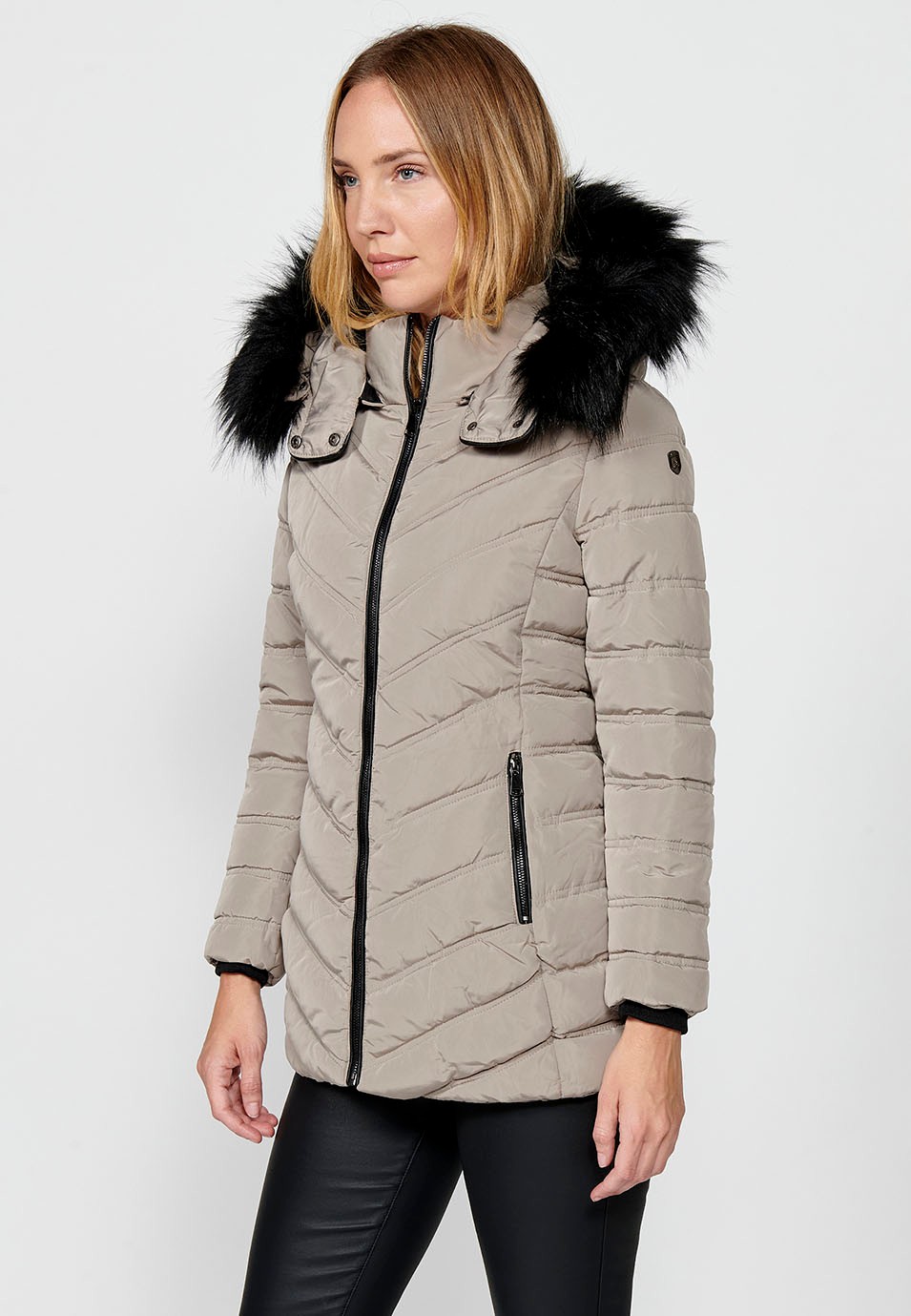 Veste matelassée à col à capuche en fausse fourrure pour femme beige avec fermeture à glissière sur le devant