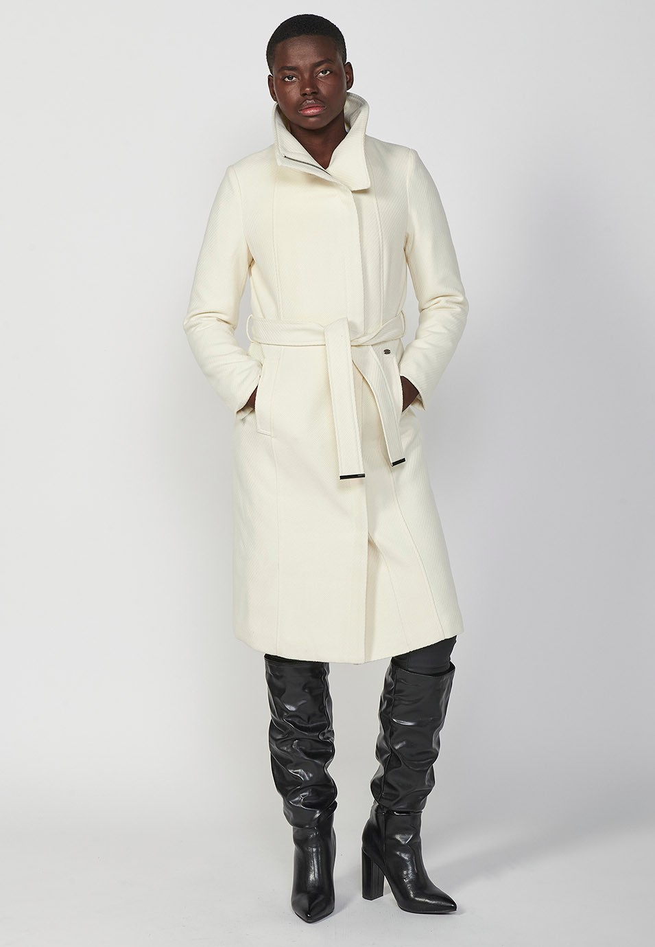 Long funnel neck zip up coat with knotted belt, lined with faux fur in ecru for women