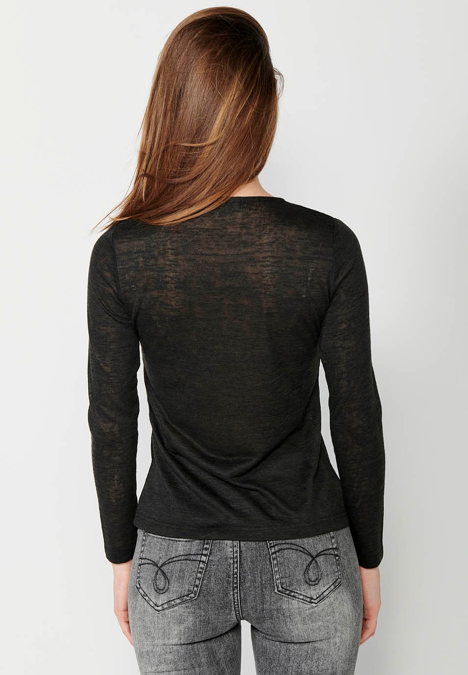 Long-sleeved, round-neck T-shirt with detail at the hem and embroidery on the front, black for women