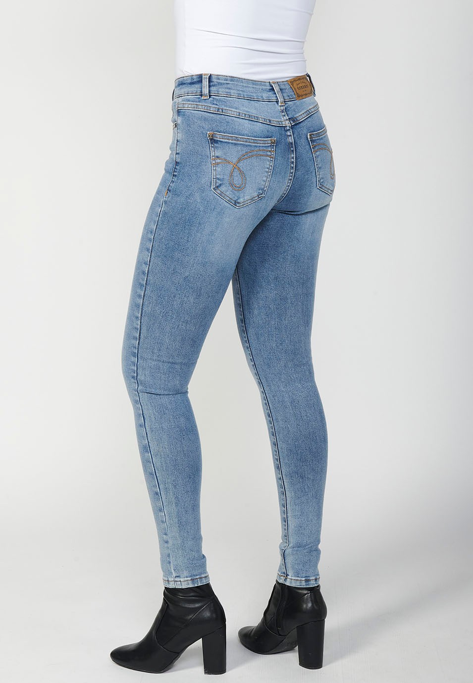 Pantalon long en jean coupe slim pour femme avec fermeture éclair et bouton sur le devant 5