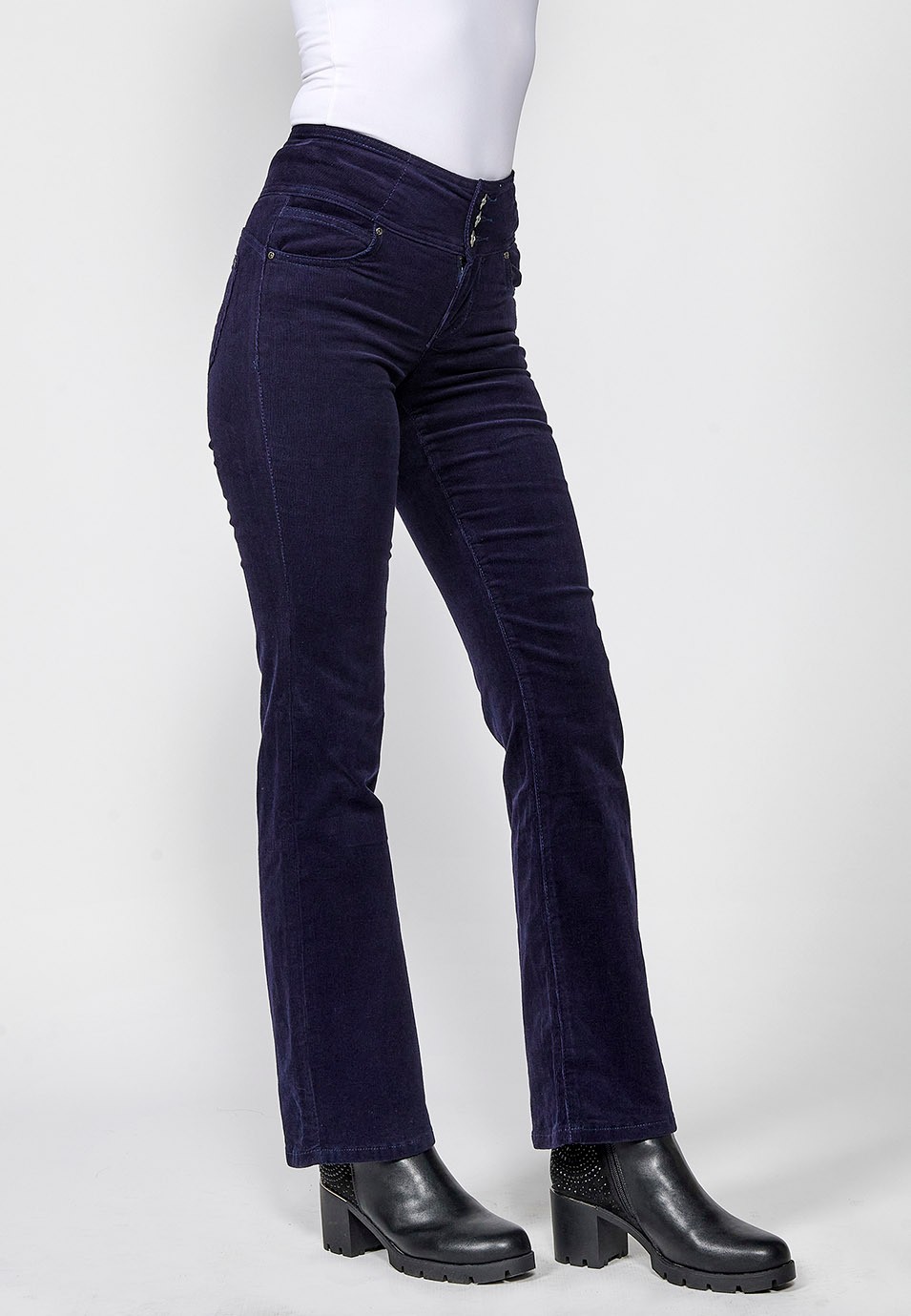 Pantalons pana cinc butxaques ajustat efecte push up i estil corset amb cintura faixí de color navy per a dona