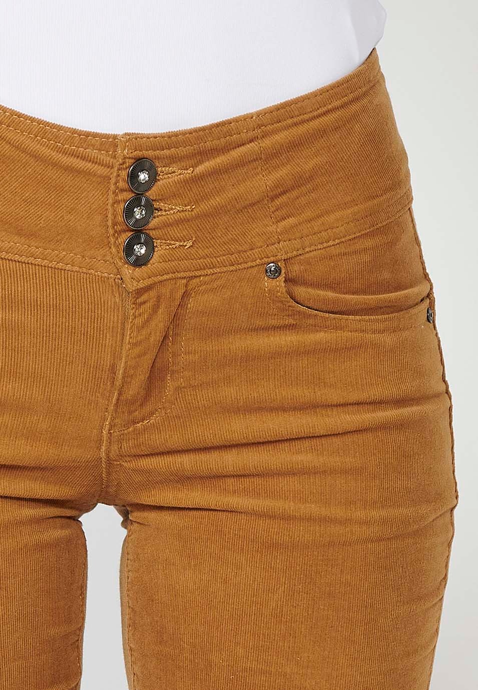 Pantalon 5 poches ajusté effet push-up et corset en velours côtelé avec ceinture camel à la taille pour femme