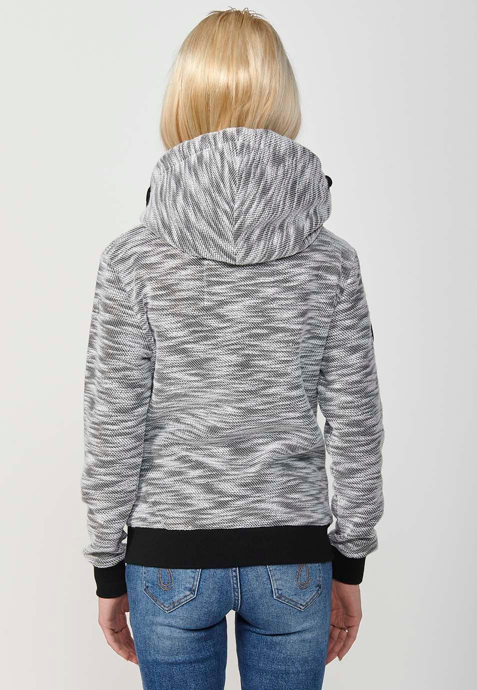 Chaqueta con capucha y tejido doble faz con exterior jaspeado e interior polar para mujer de color blanco