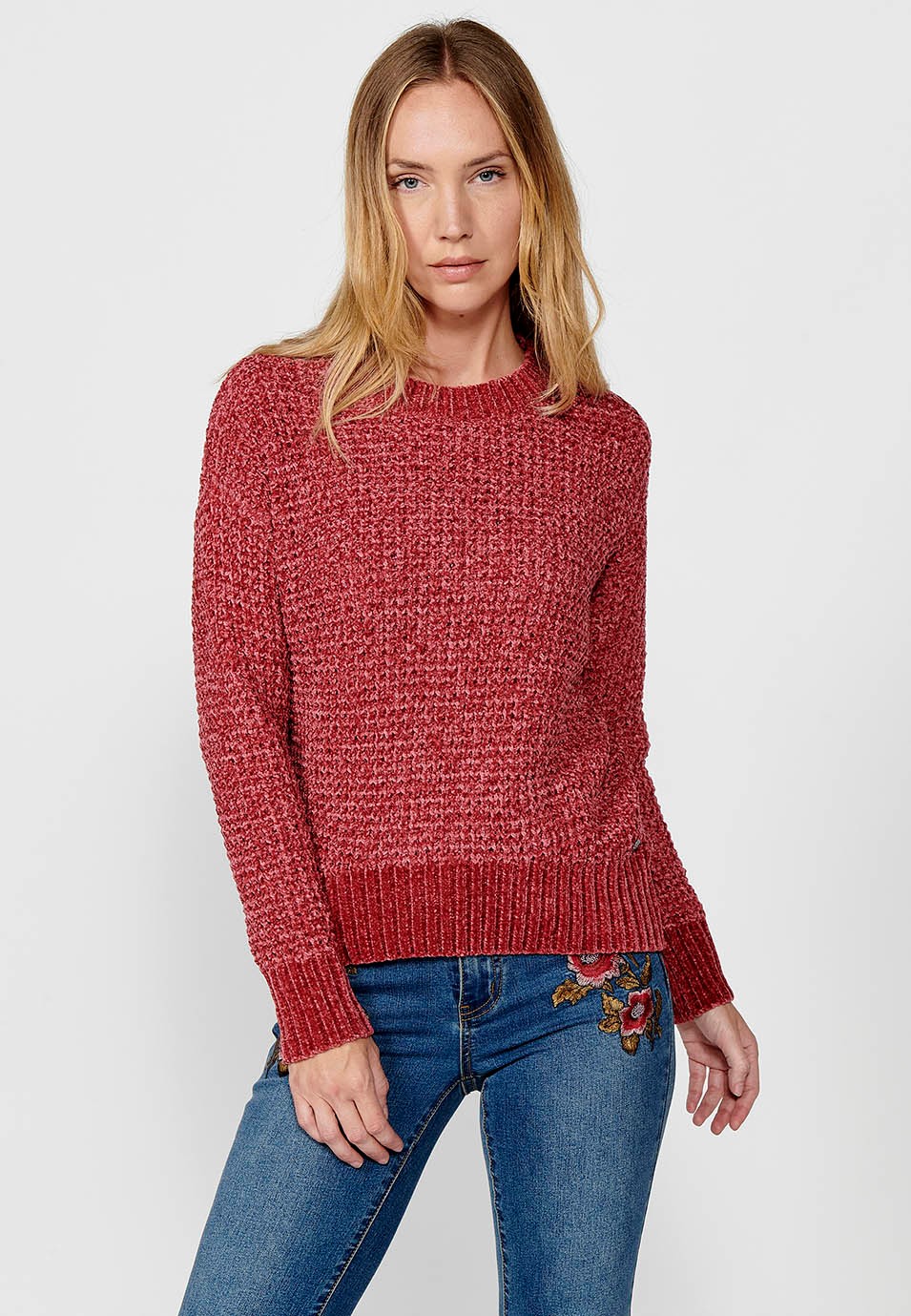 Pull col rond avec larges côtes dans le bas pour femme en rose