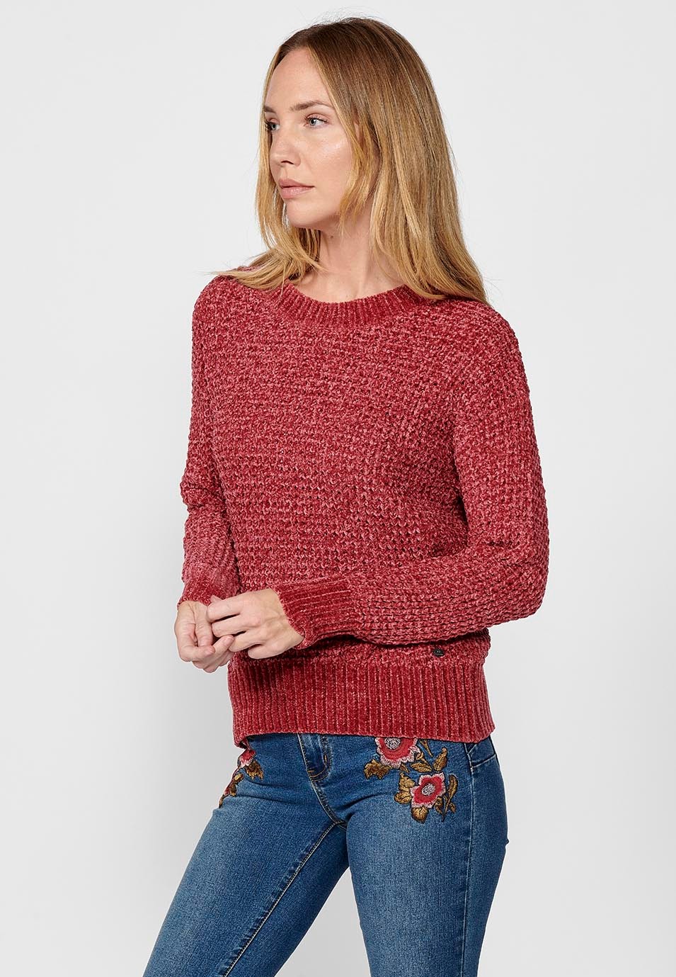 Pull col rond avec larges côtes dans le bas pour femme en rose