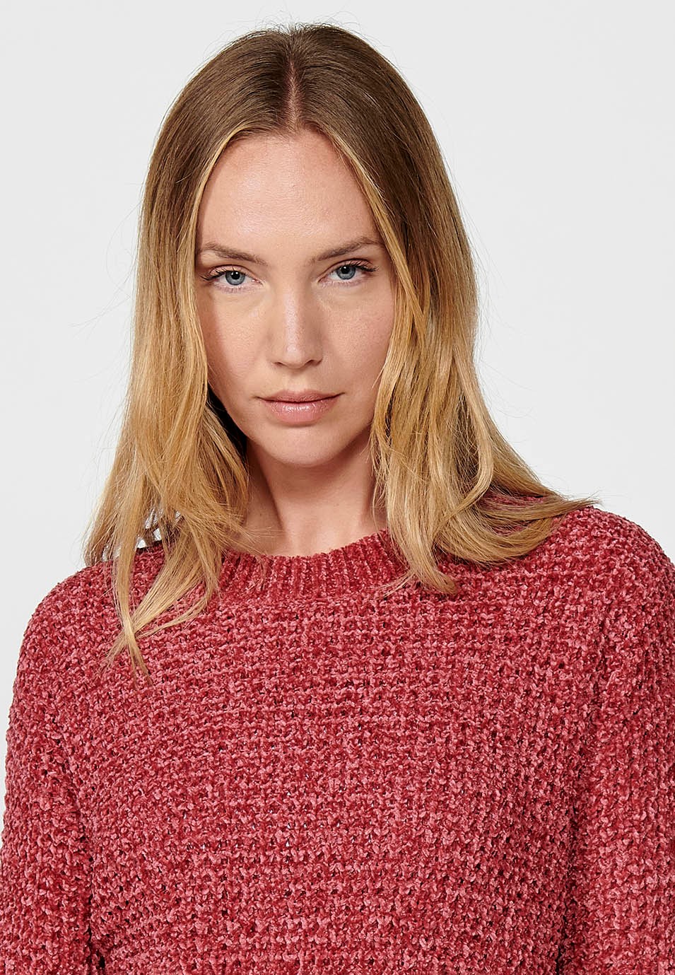 Pull col rond avec larges côtes dans le bas pour femme en rose