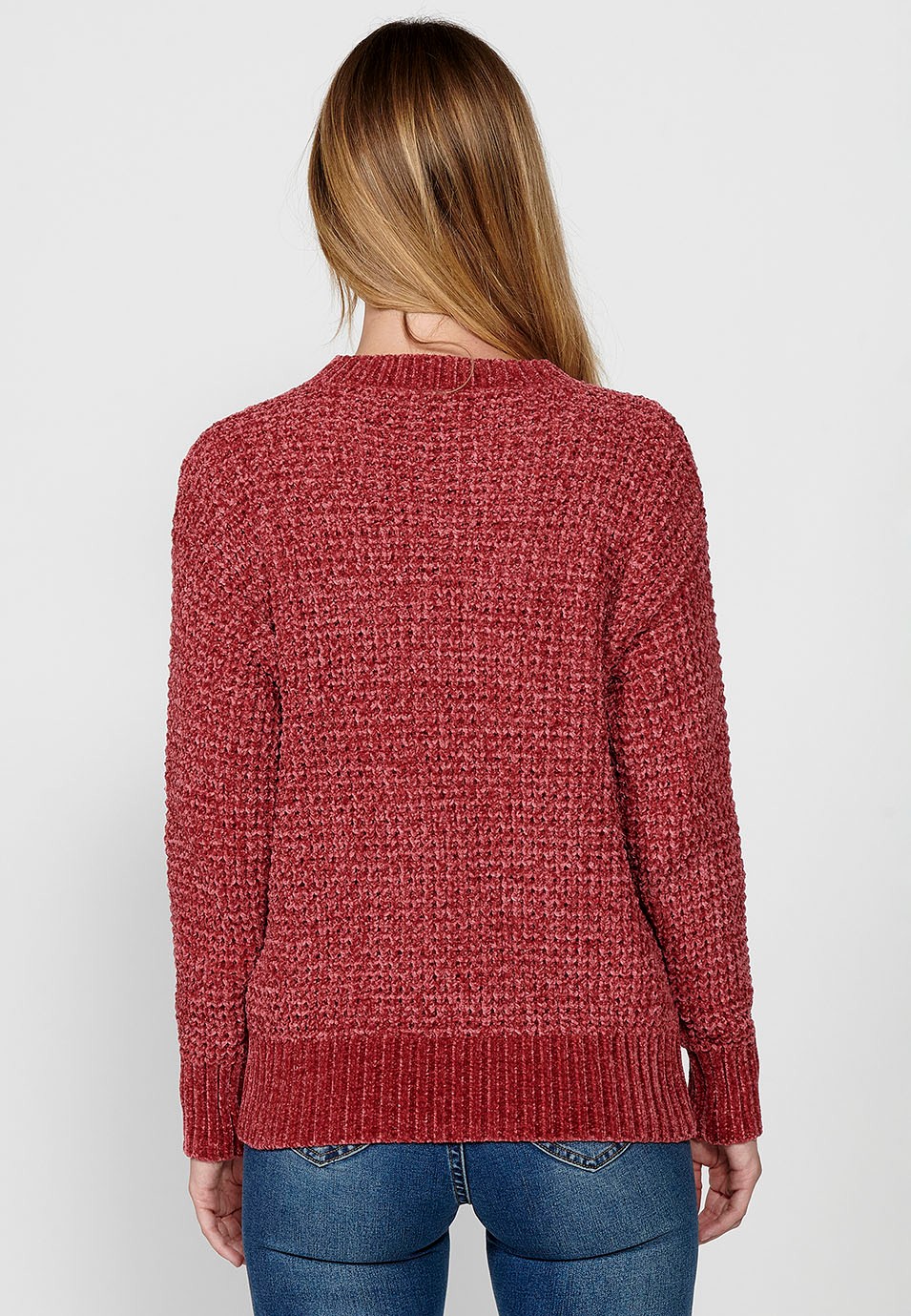 Pull col rond avec larges côtes dans le bas pour femme en rose