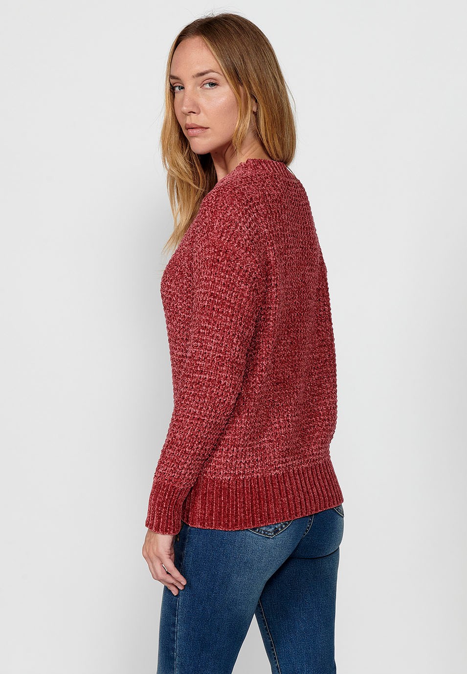 Pull col rond avec larges côtes dans le bas pour femme en rose