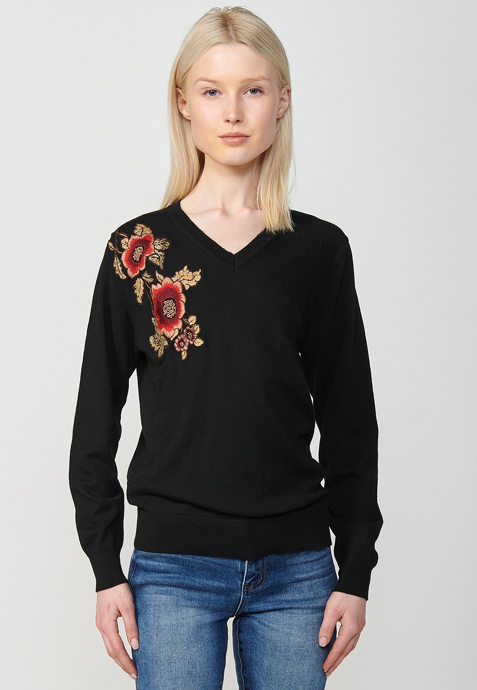 Langärmliger Pullover mit V-Ausschnitt und gestickter Blume für Damen in Schwarz