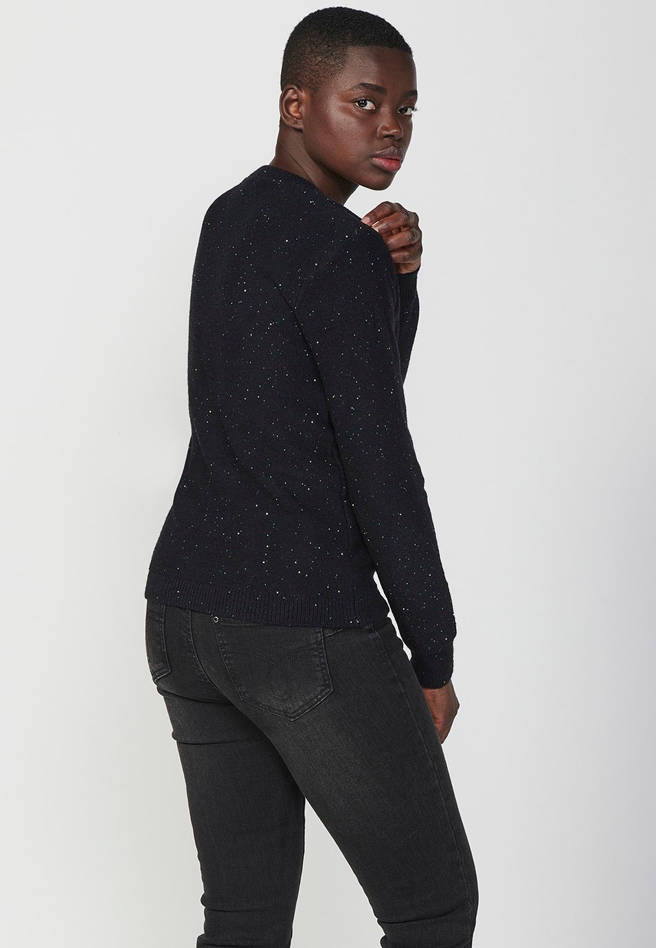 Pull col rond manches longues avec fils mouchetés de paillettes pour femme en noir