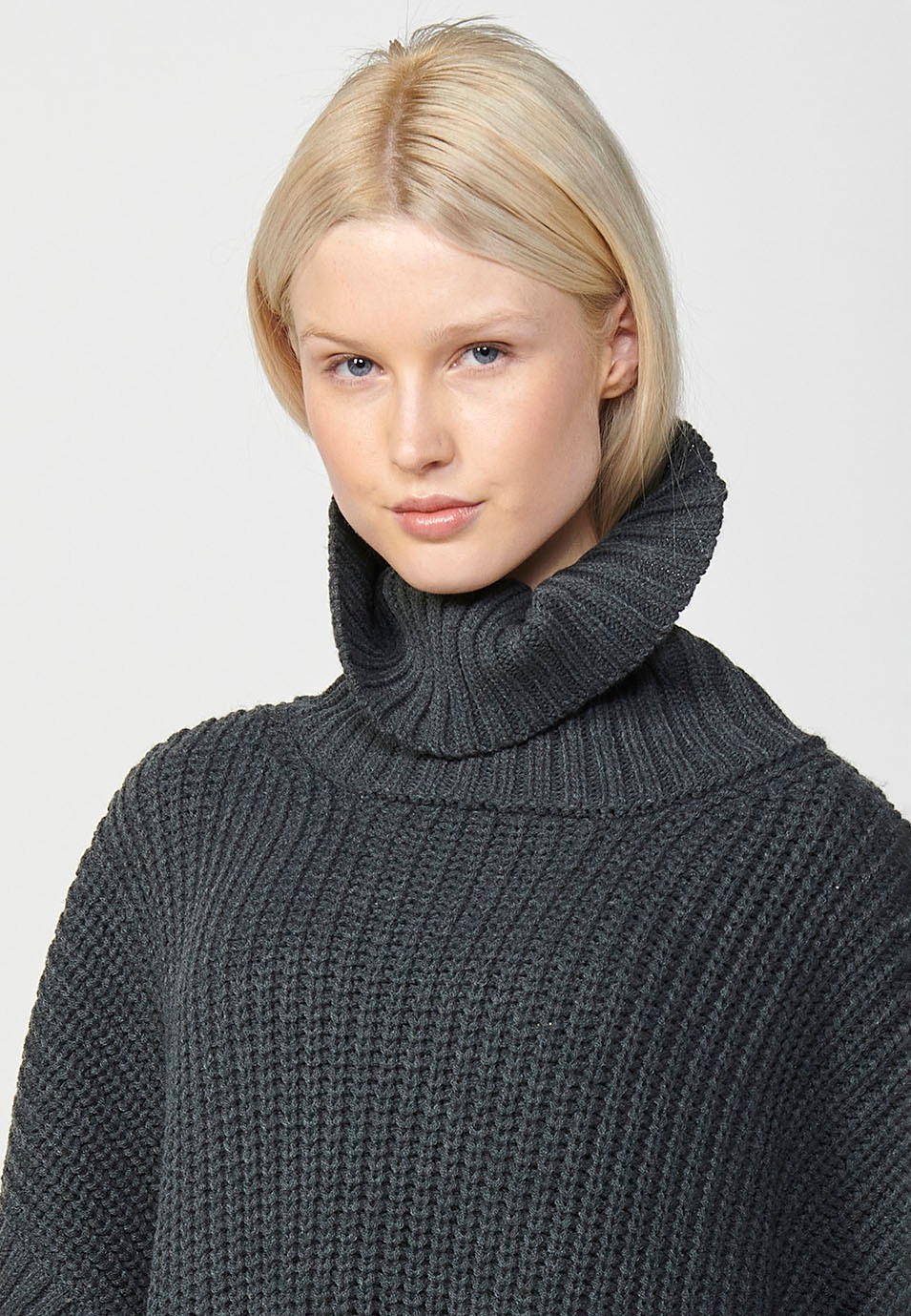 Women's grey cape knit turtleneck jumper with front patch pockets