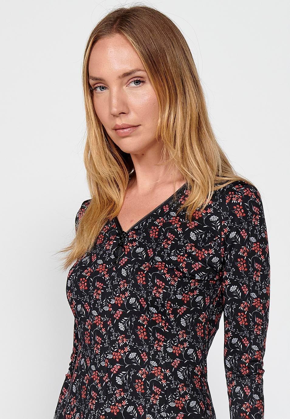 Vestido de manga larga y escote pico con cremallera y estampado floral para mujer en color negro