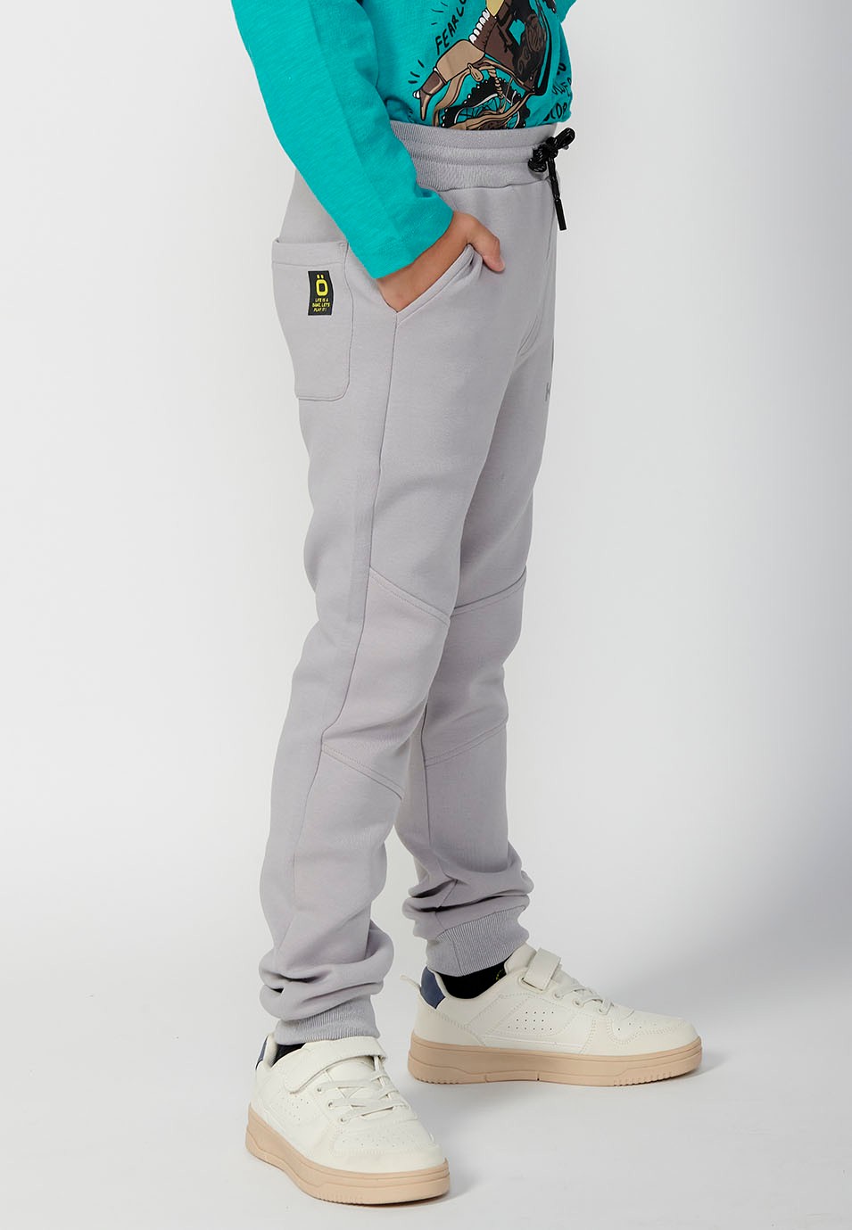 Long trousers with ribbed finish and elasticated waist for boys in grey 1