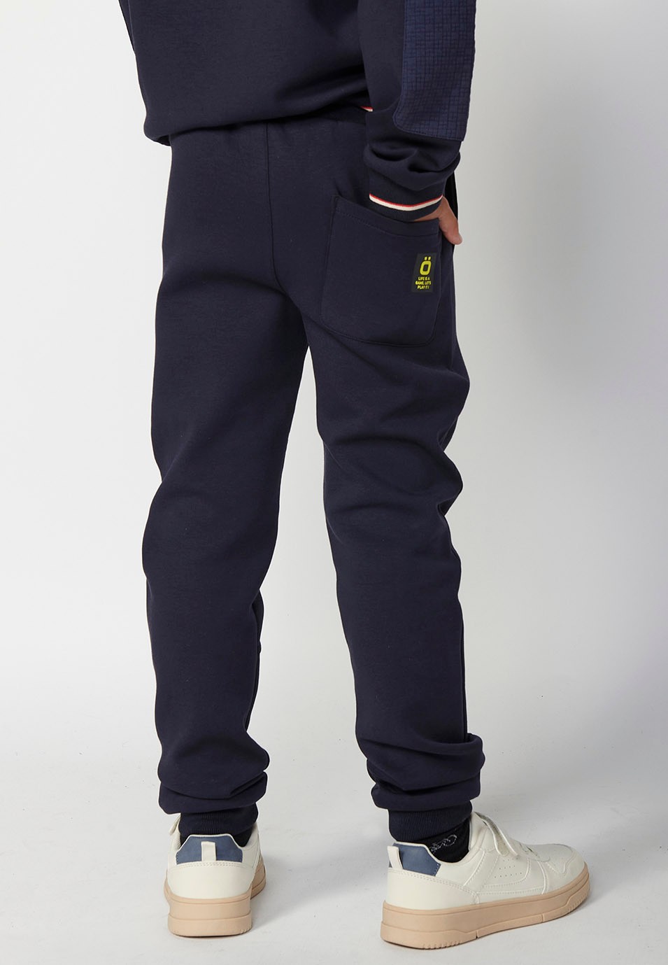 Pantalon long avec finition côtelée et taille caoutchoutée pour garçon en bleu marine 1