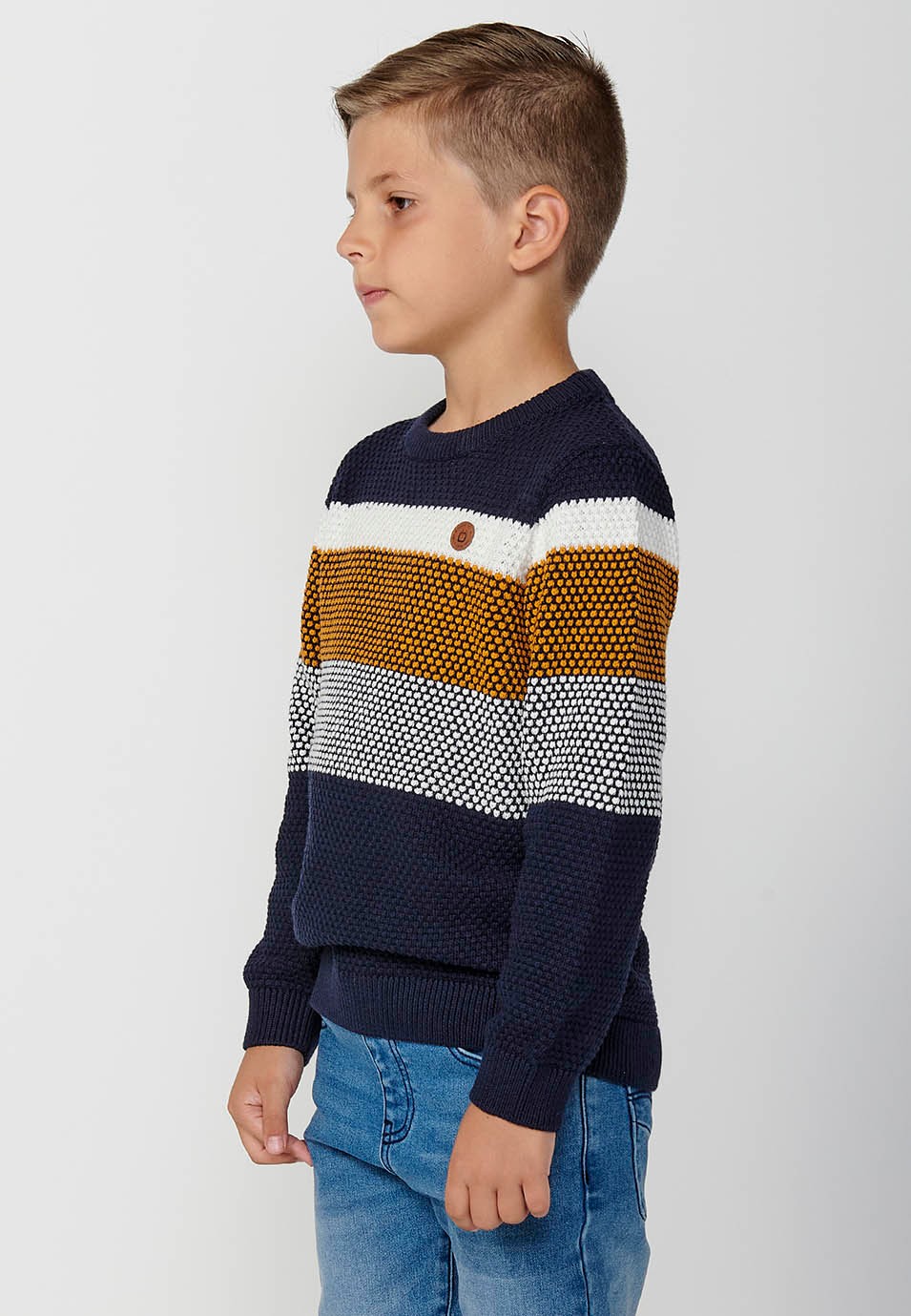 Jersey de manga larga y cuello redondo con tricot en tres colores para niño de color amarillo