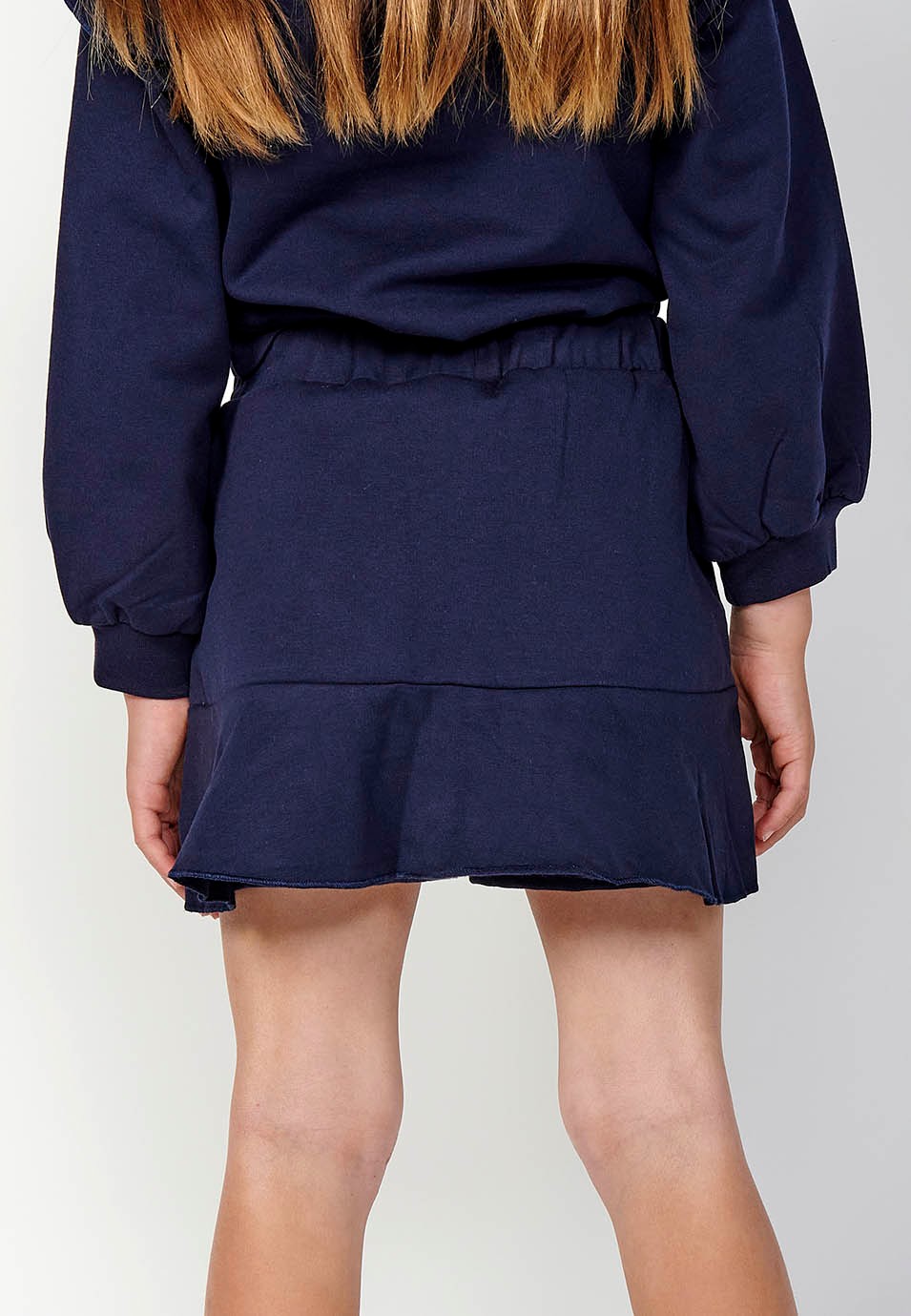 Falda corta con volante y Cintura engomada color Navy para Niña