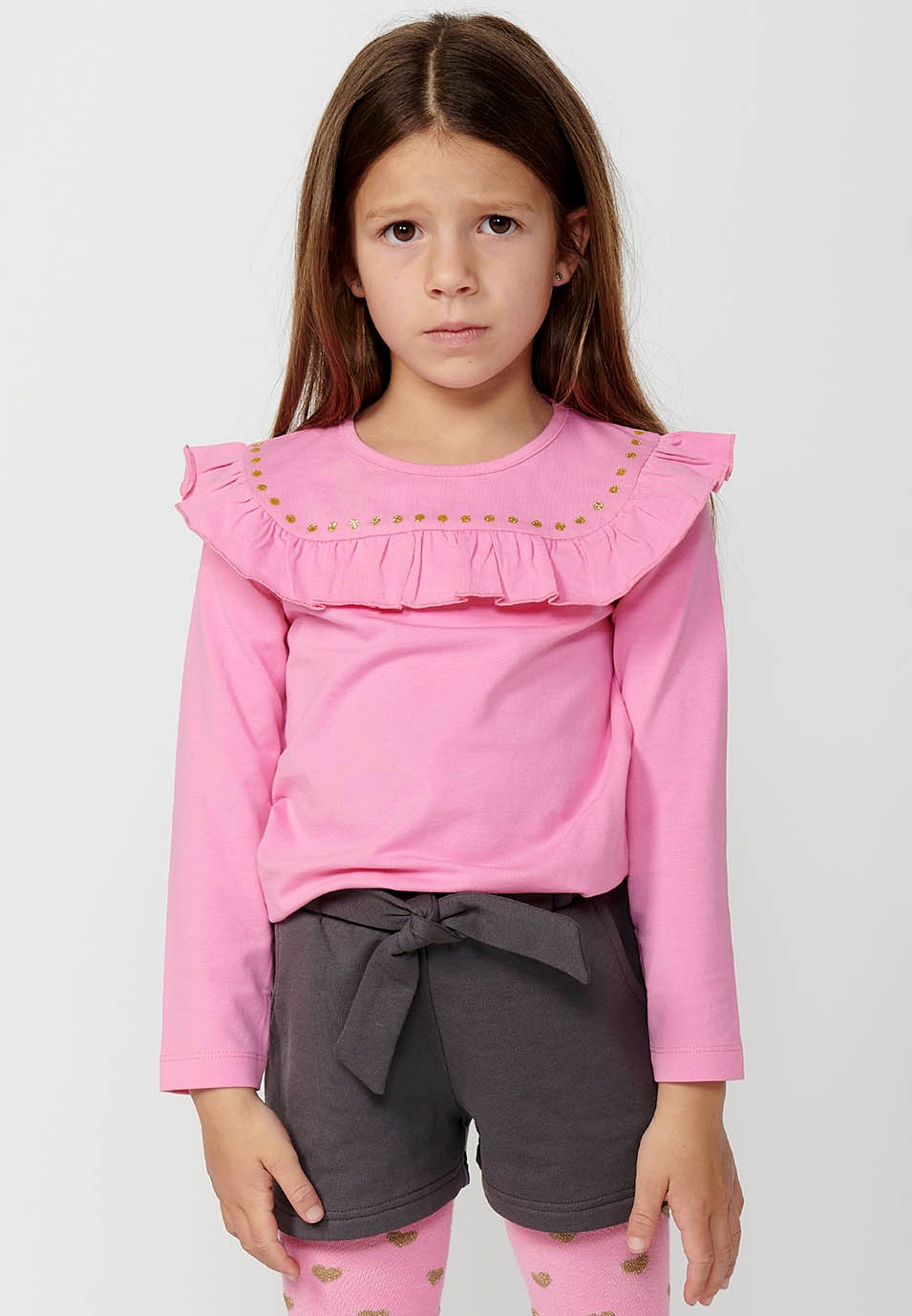 Camiseta de manga larga con detalle de volante para niña de color rosa