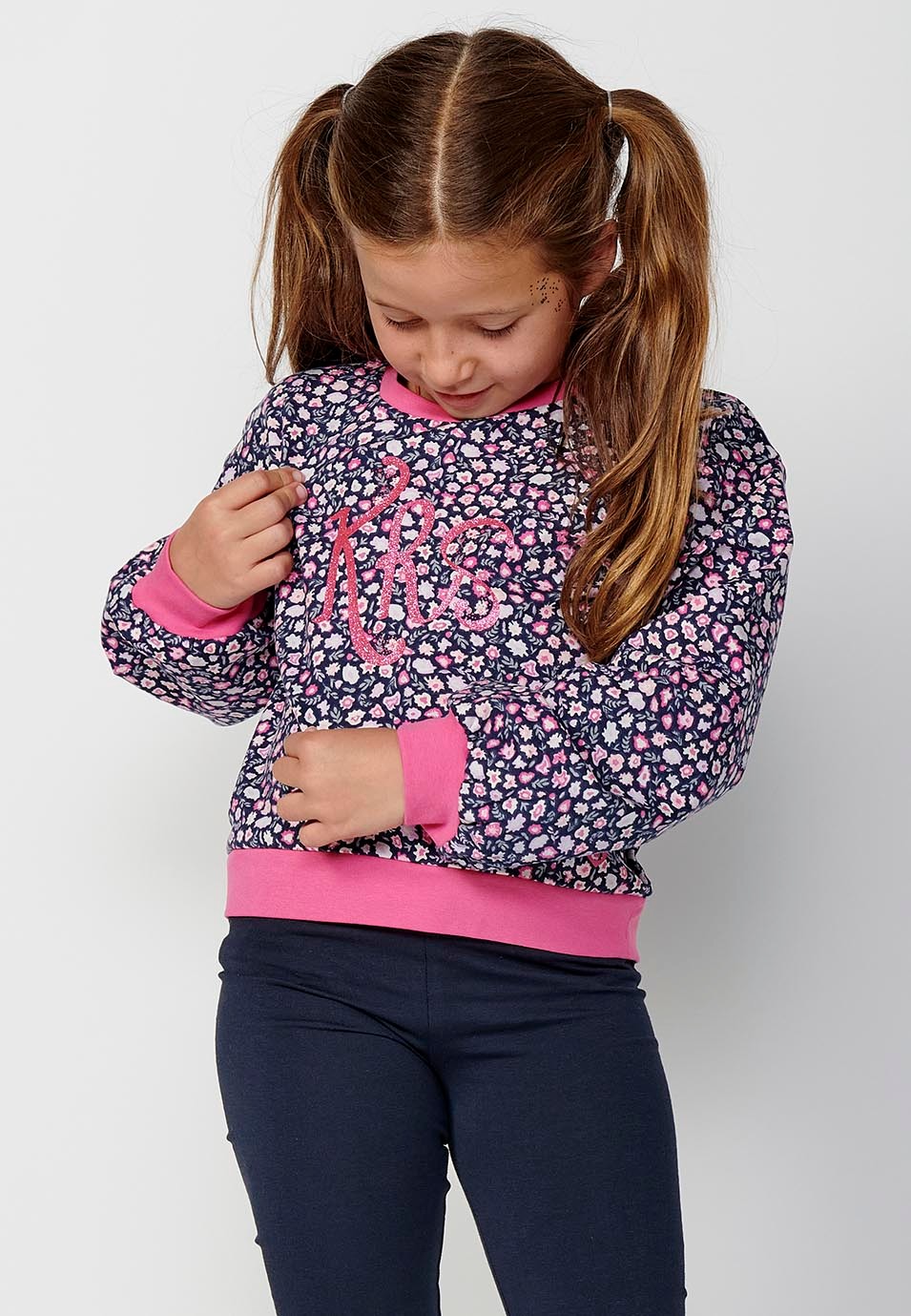 Girls' long-sleeved crewneck sweatshirt with floral print front detail in navy