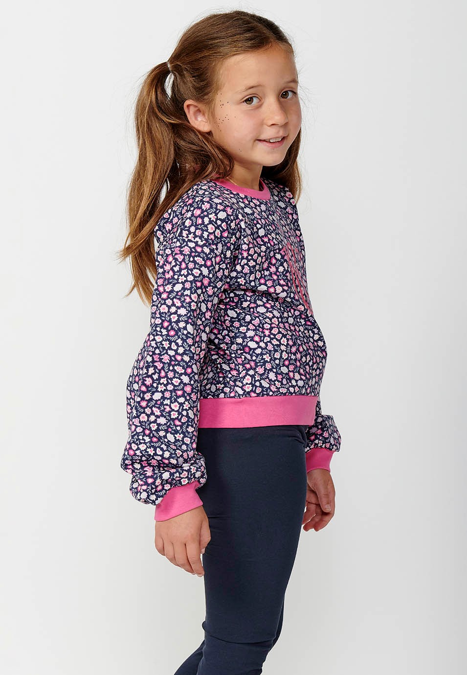 Girls' long-sleeved crewneck sweatshirt with floral print front detail in navy