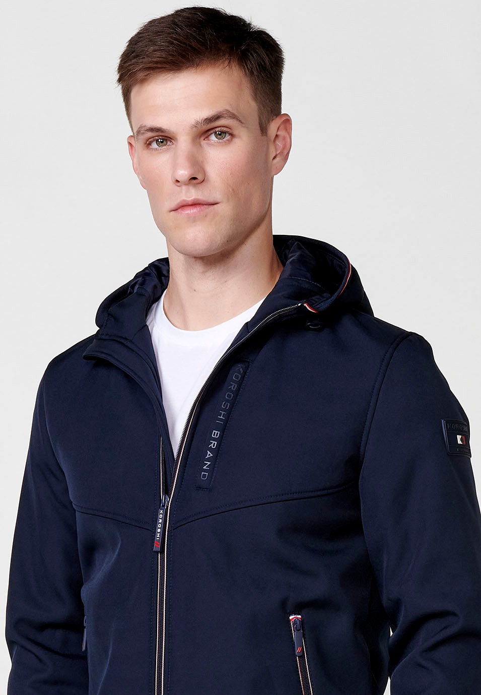 Chaqueta Cazadora con cuello con capucha y Cierre delantero con cremallera y Bolsillos con cremallera color Navy para Hombre