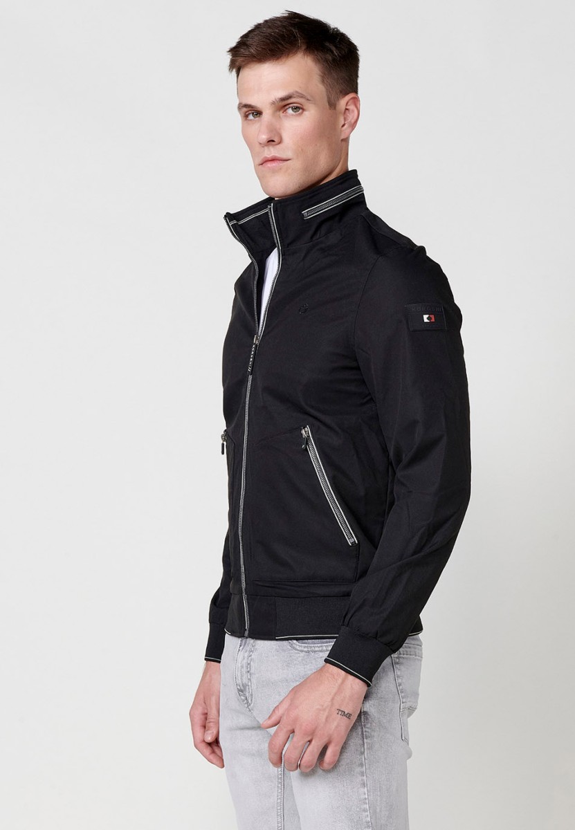 Chaqueta cazadora con cuello alto y puños elasticos para hombre en color negro