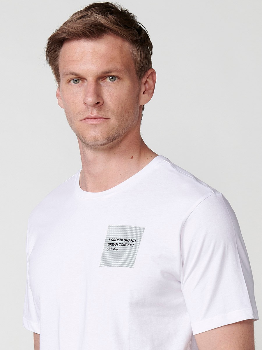 T-shirt blanc à manches courtes pour homme avec imprimé sur la poitrine