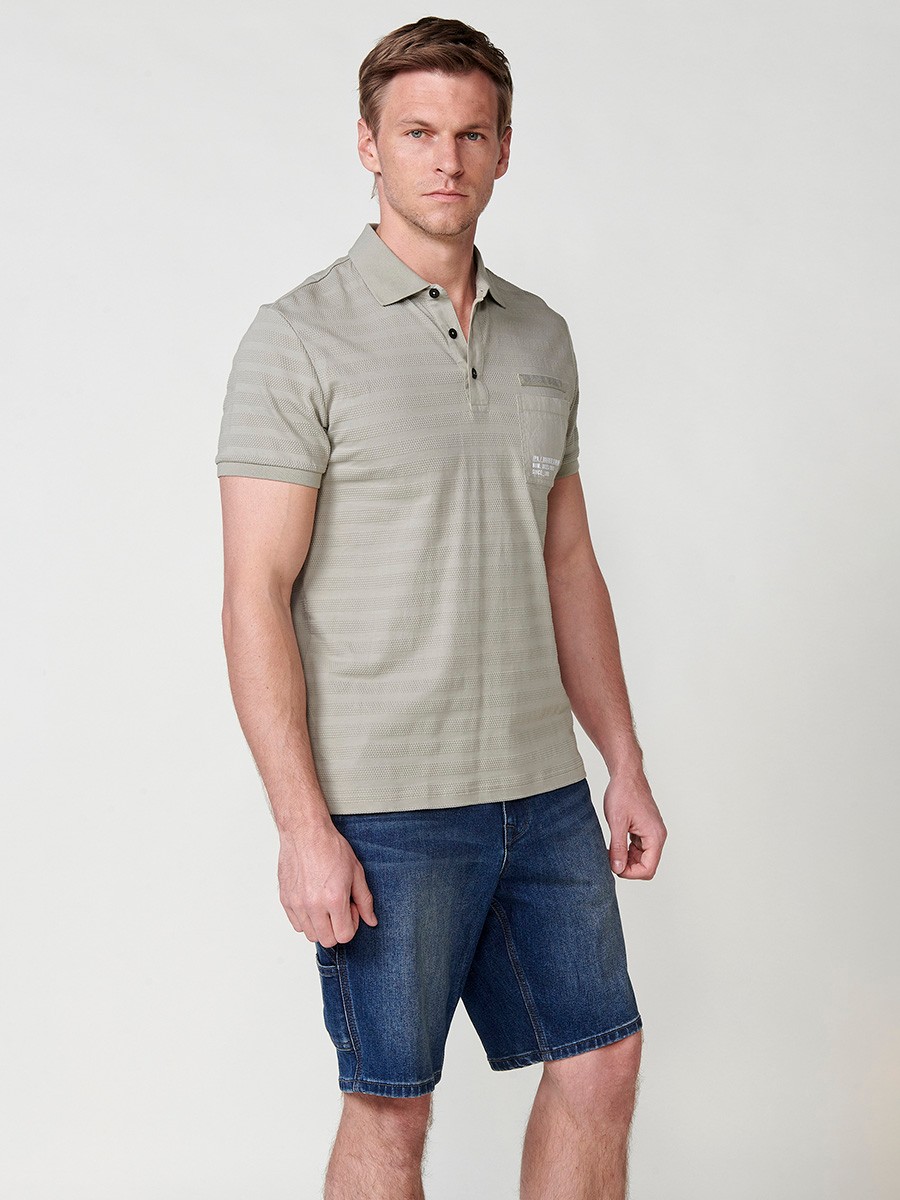 Camiseta polo de manga corta texturizada para hombre en color verde