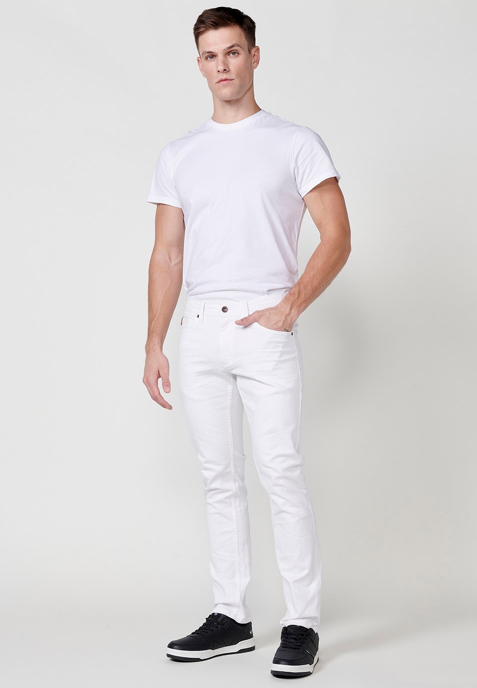 Pantalon long droit coupe classique avec cinq poches et une poche en Blanc pour Homme