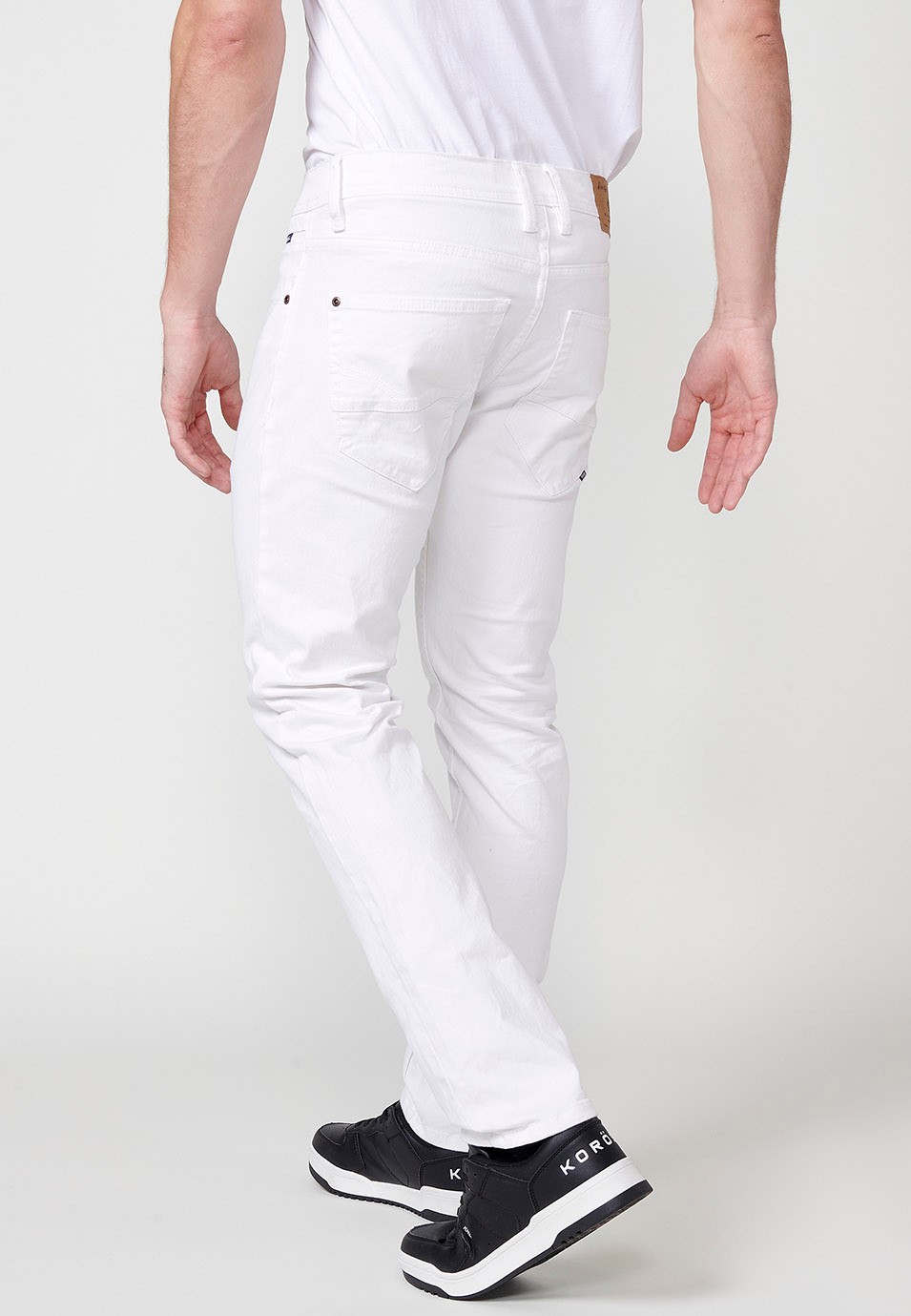 Pantalon long droit coupe classique avec cinq poches et une poche en Blanc pour Homme