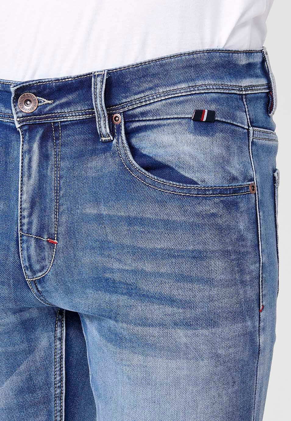 Pantalon long coupe slim avec cinq poches et une poche ticket bleue pour Homme