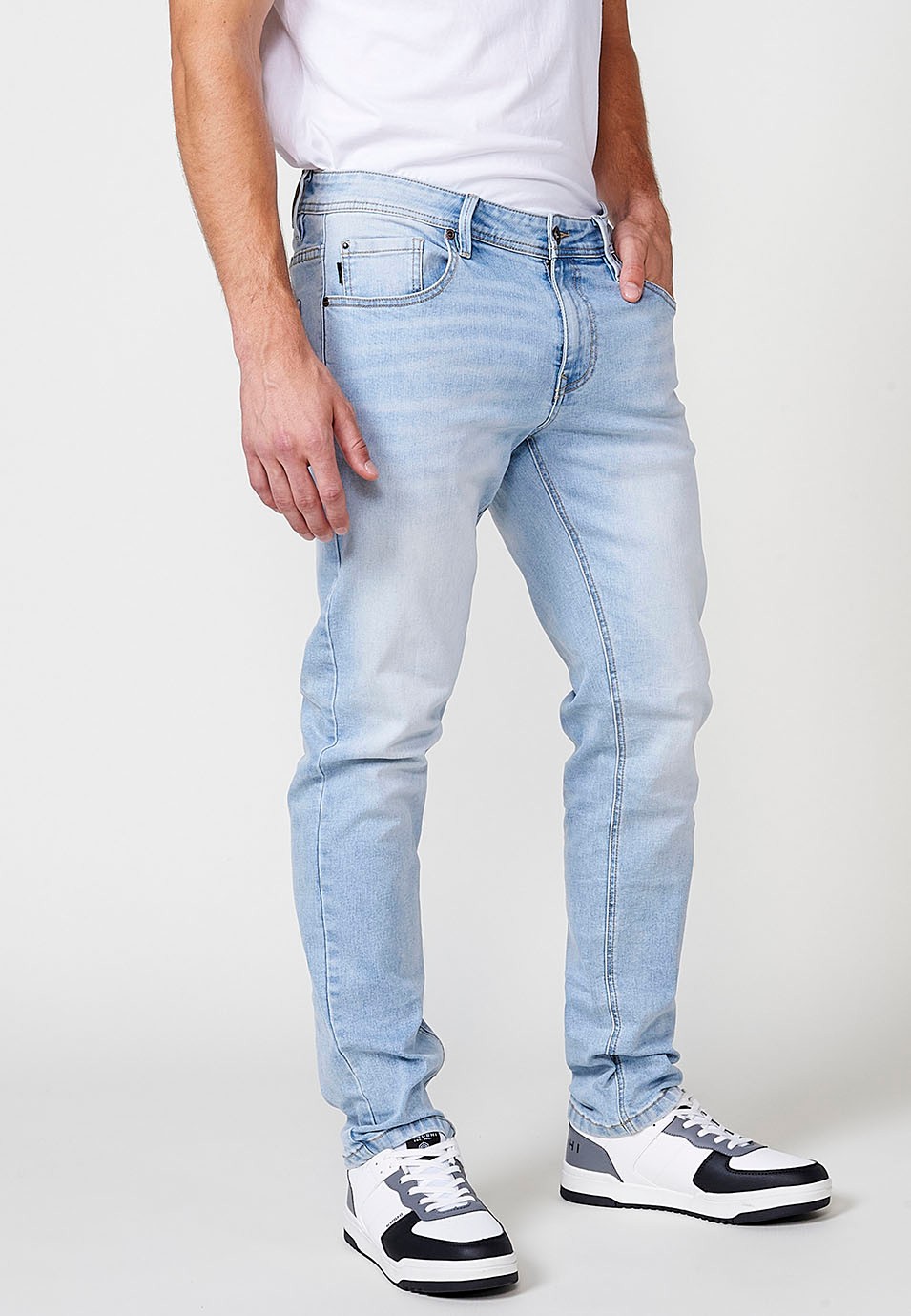 Pantalón largo denim super skinny con Cinco bolsillos, uno cerillero color Azul para Hombre