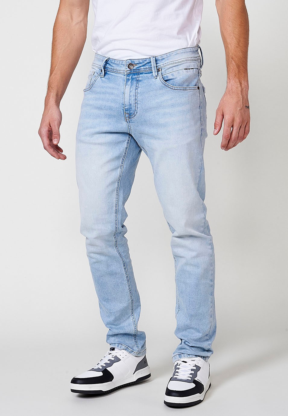 Pantalón largo denim super skinny con Cinco bolsillos, uno cerillero color Azul para Hombre