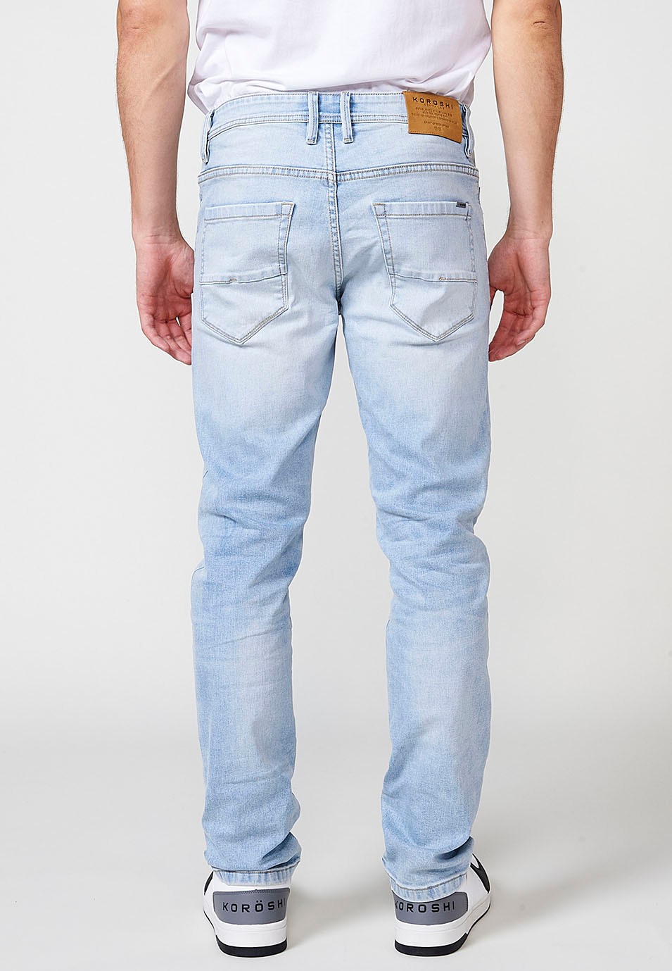 Pantalón largo denim super skinny con Cinco bolsillos, uno cerillero color Azul para Hombre