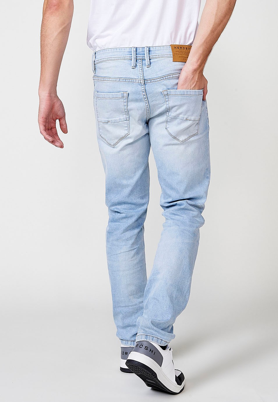 Pantalón largo denim super skinny con Cinco bolsillos, uno cerillero color Azul para Hombre