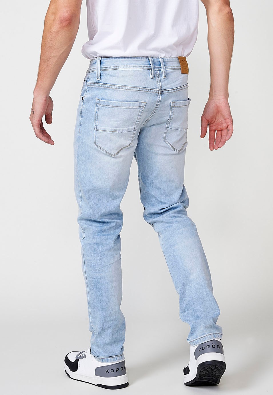 Pantalón largo denim super skinny con Cinco bolsillos, uno cerillero color Azul para Hombre