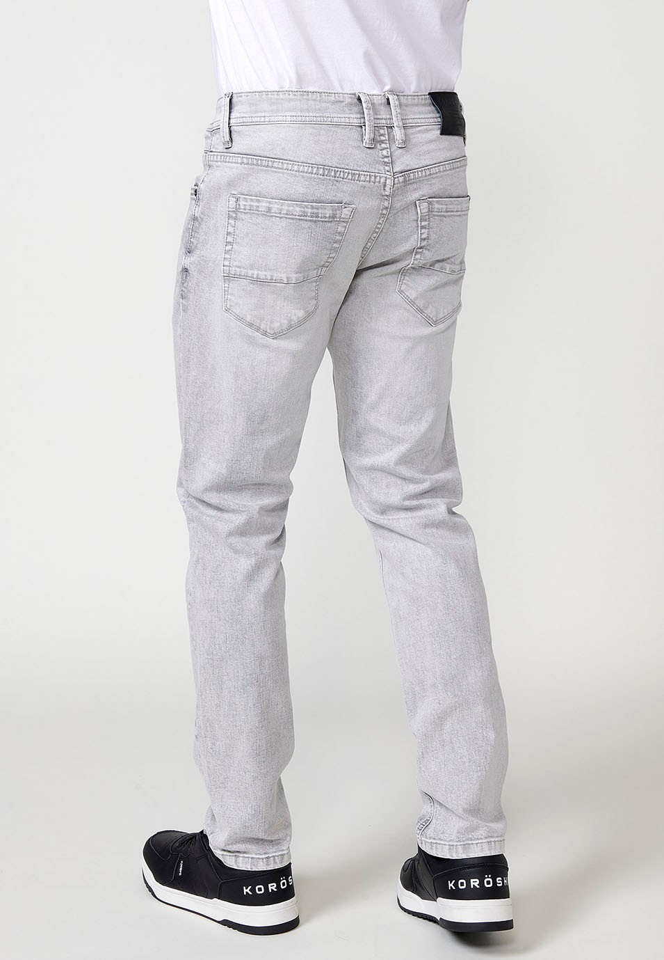 Pantalón largo denim super skinny con Cinco bolsillos, uno cerillero color Denim Gris para Hombre